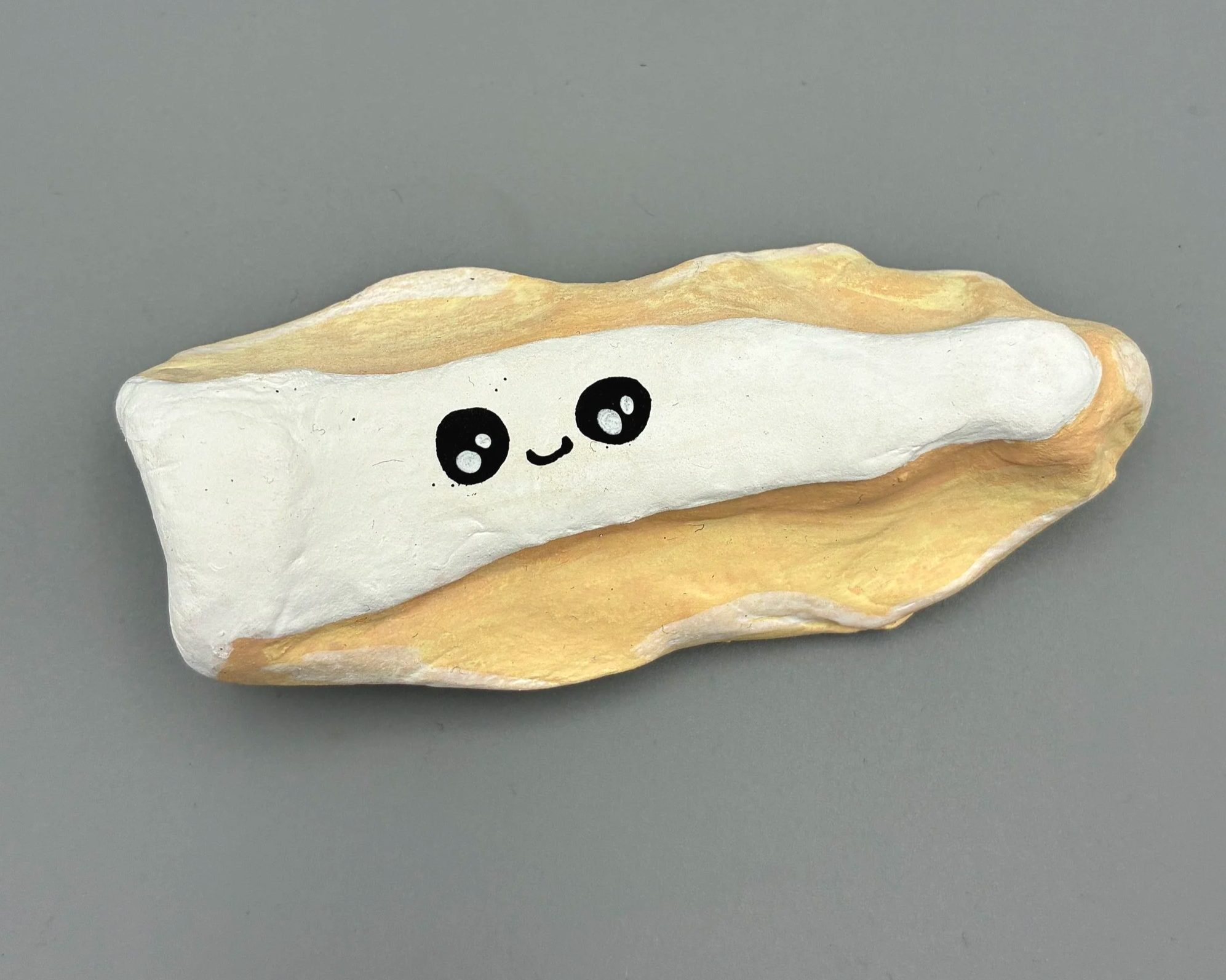 Brie cheese cute handmade handpainted clay desk buddy by Devon artist Helen Leslie Illustrator