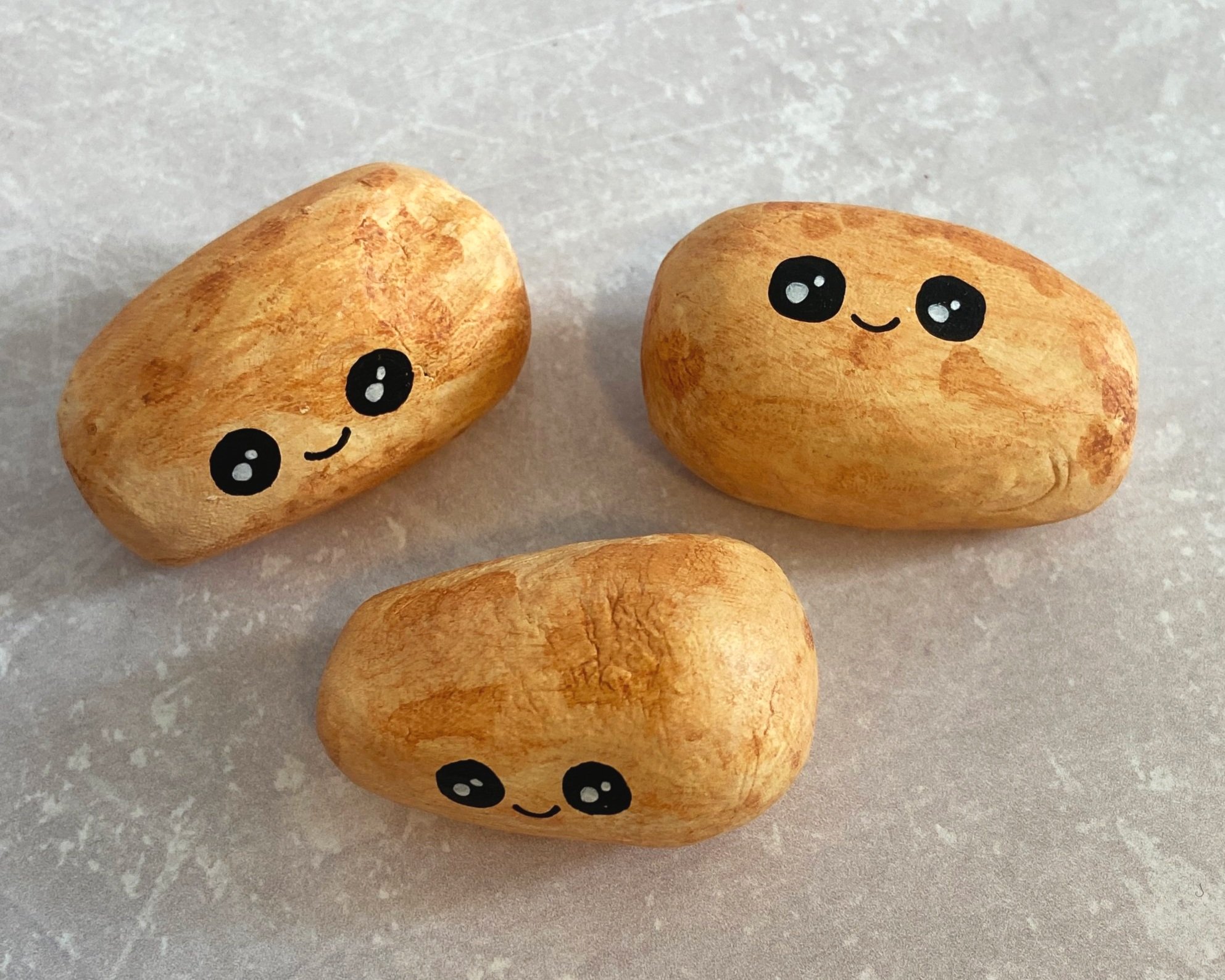 Potato cute clay character desk buddy handmade by Devon artist Helen Leslie Illustrator