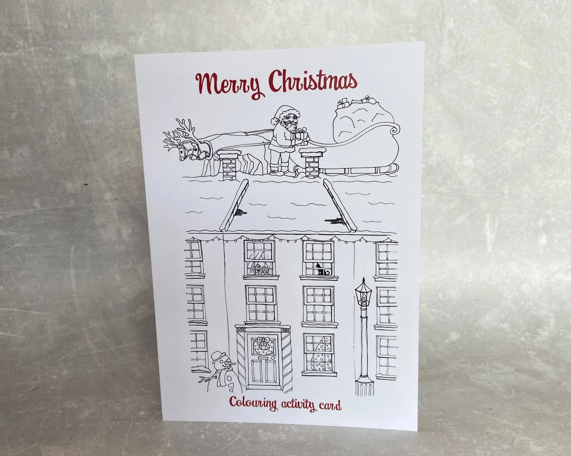 Christmas colouring activity card for children by Devon artist Helen Leslie Illustrator