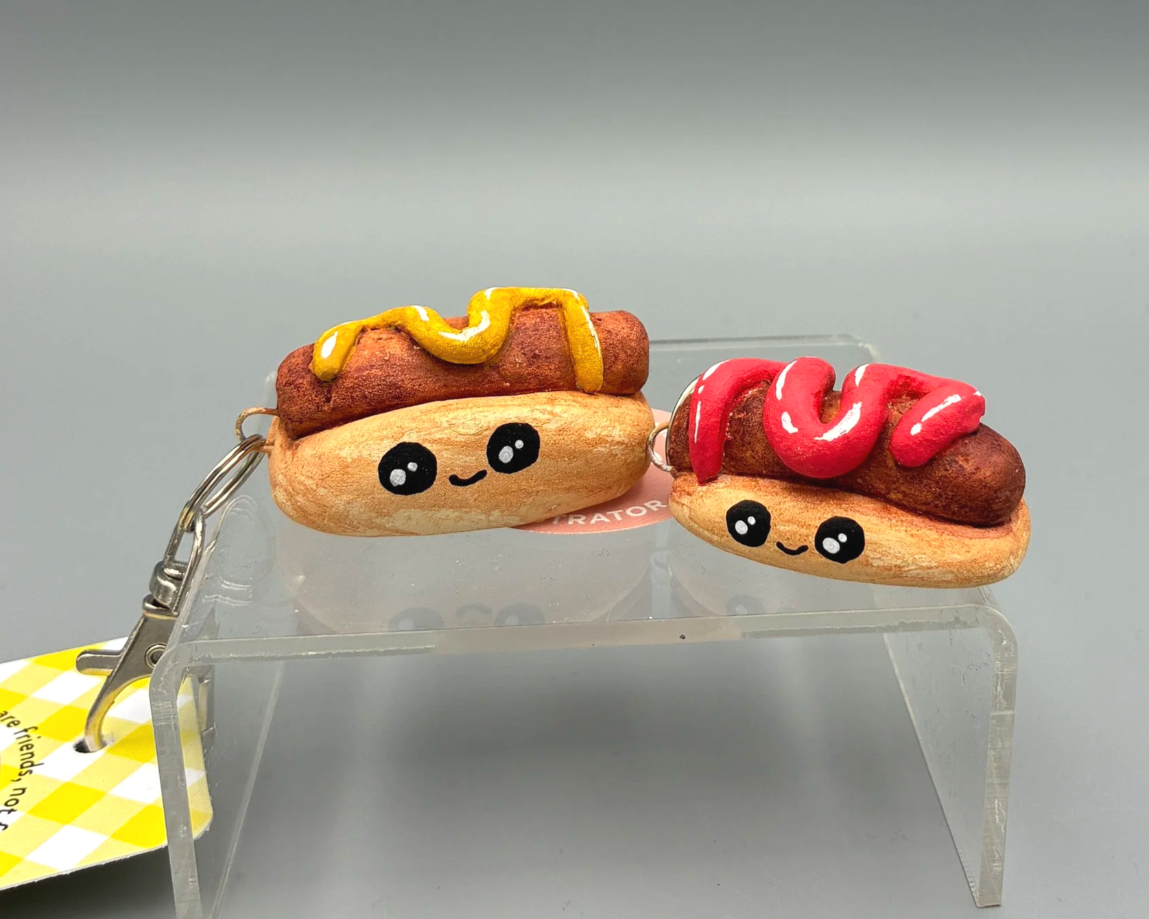 Hotdog clay bag charm keychain keyring handmade by Devon artist Helen Leslie Illustrator