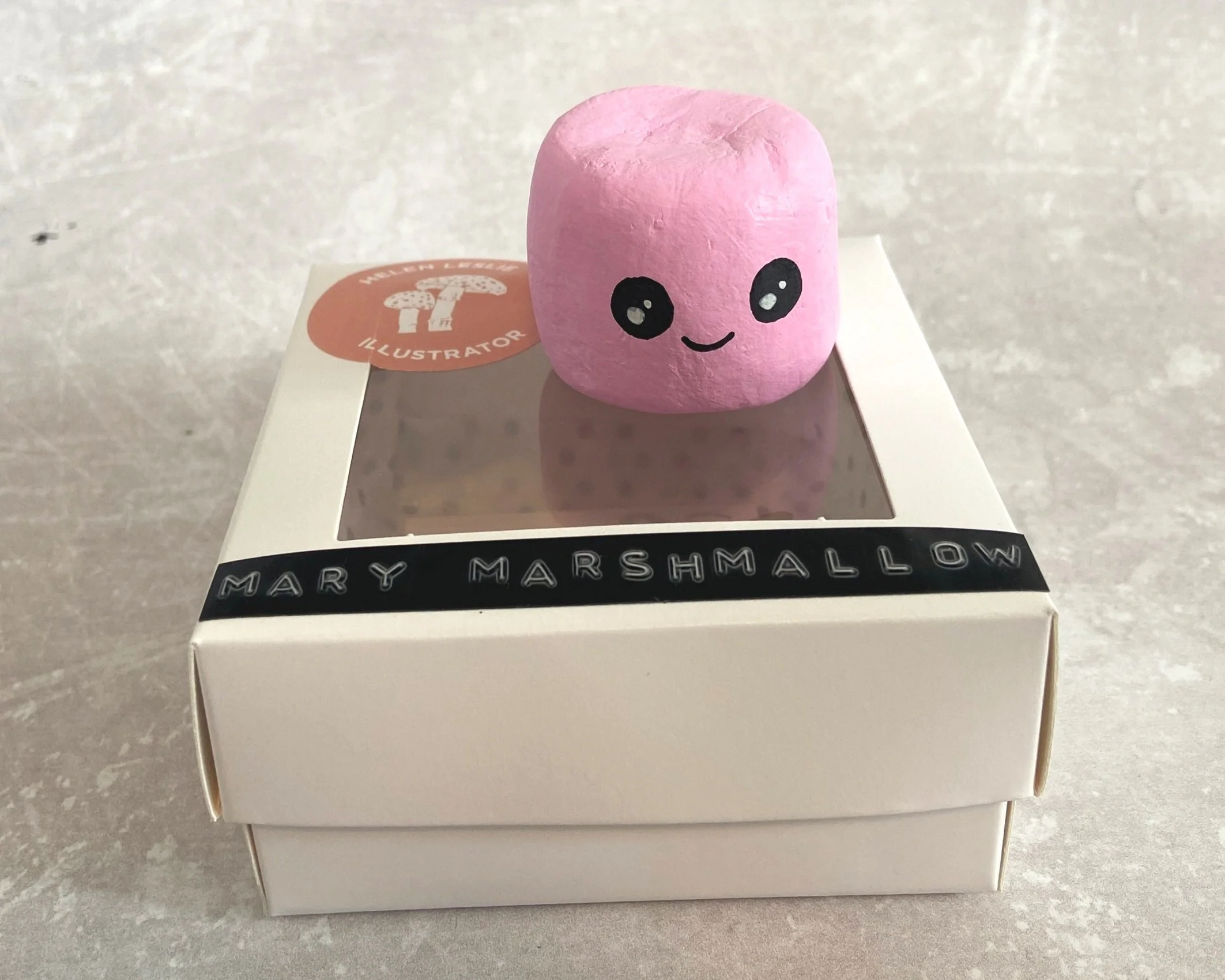 Marshamallow cute clay character desk buddy handmade by Devon artist Helen Leslie Illustrator