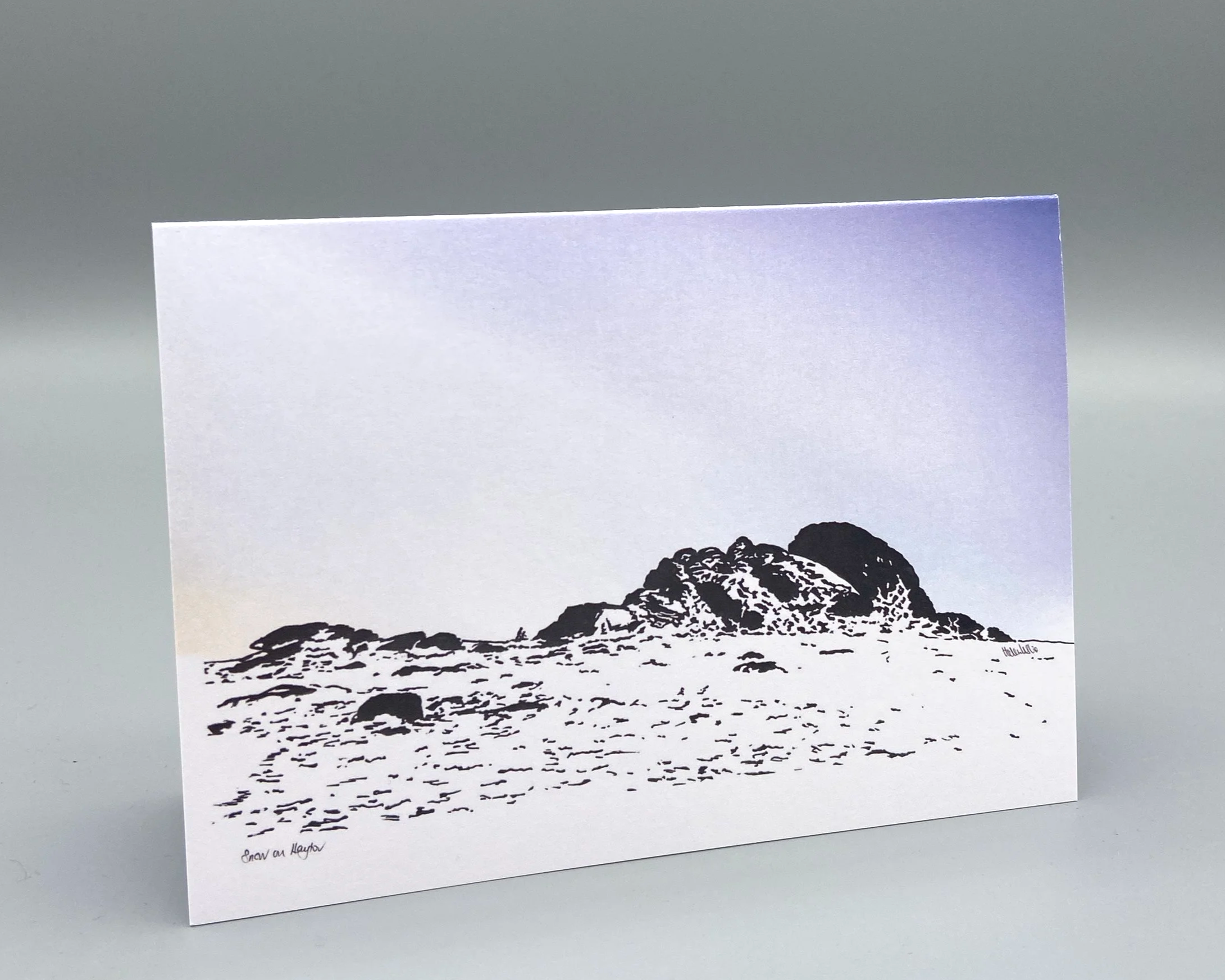 Haytor on a snowy day at dusk, on Dartmoor in Devon. Illustrated by Devon artist Helen Leslie