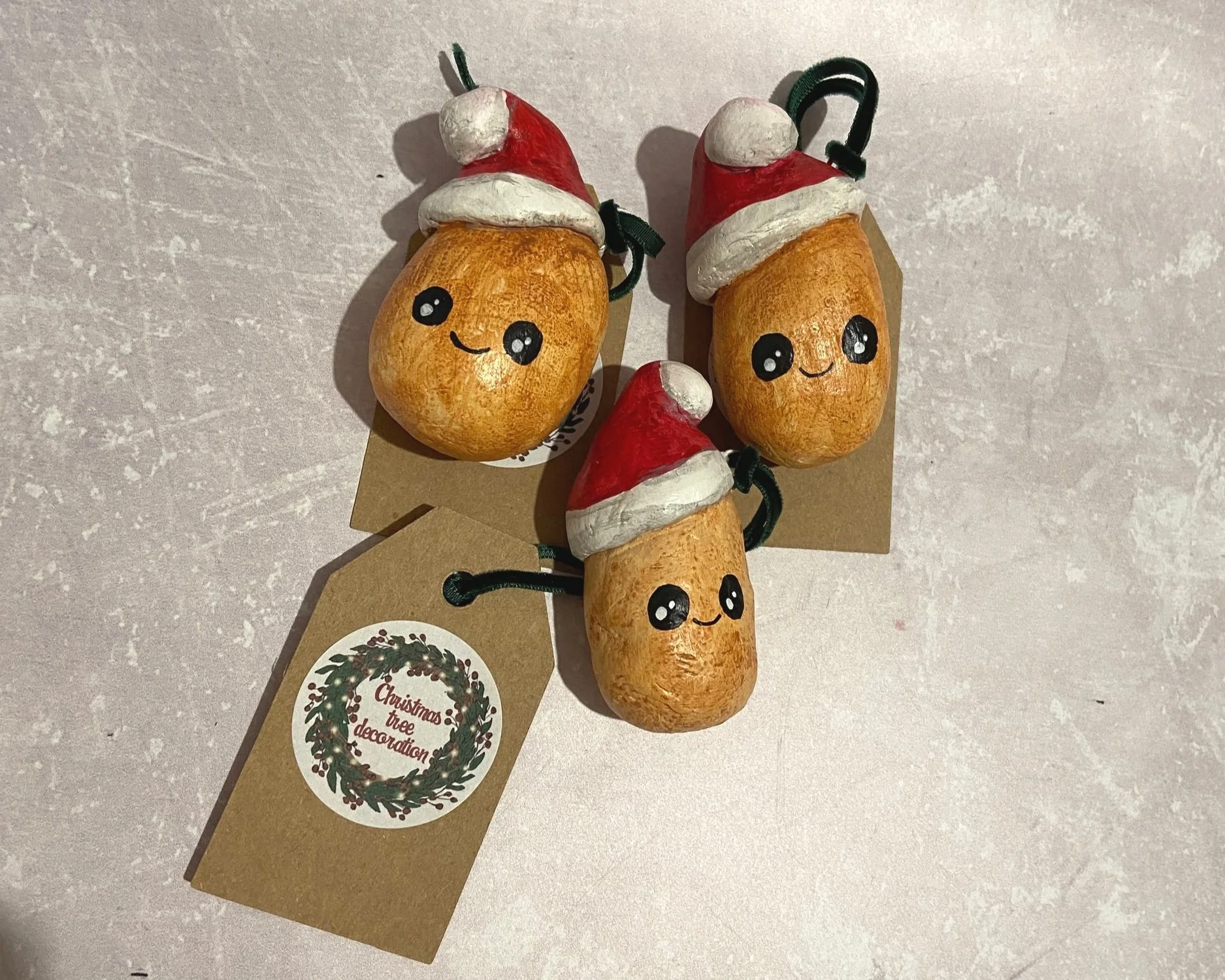 Santa Spud Handmade cute kawaii food clay Christmas tree decorations handpainted by Devon artist Helen Leslie Illustrator