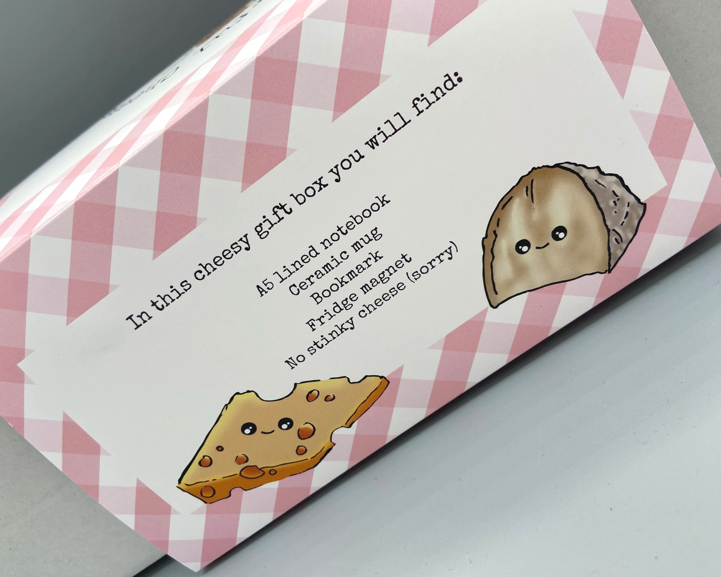 Cheerful Cheeses collection gift box illustrated cheeses on mug, notebook, bookmark and fridge magnet in beautifully designed packaged gift box ideal Christmas gift for cheese lovers