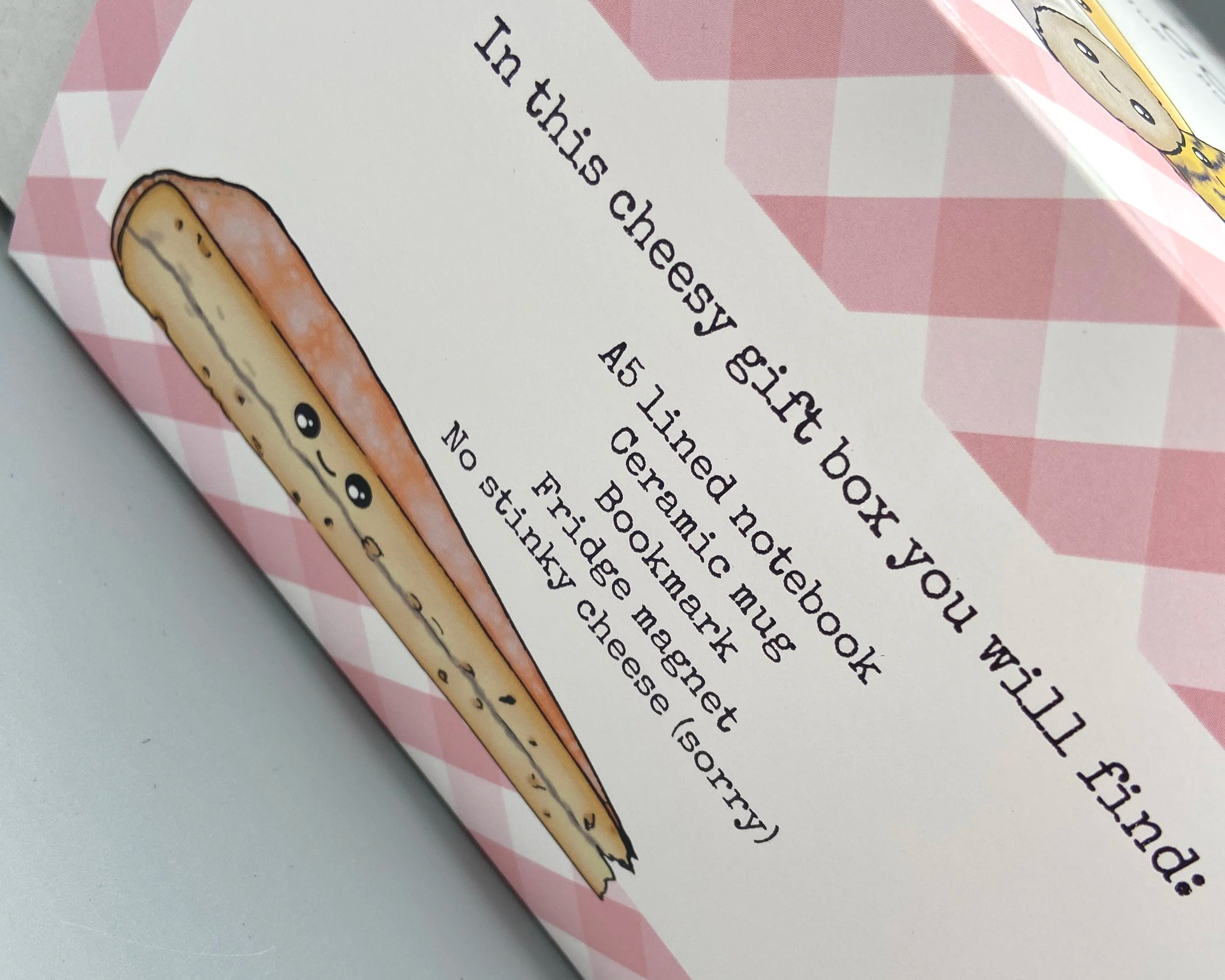 Cheerful Cheeses collection gift box illustrated cheeses on mug, notebook, bookmark and fridge magnet in beautifully designed packaged gift box ideal Christmas gift for cheese lovers