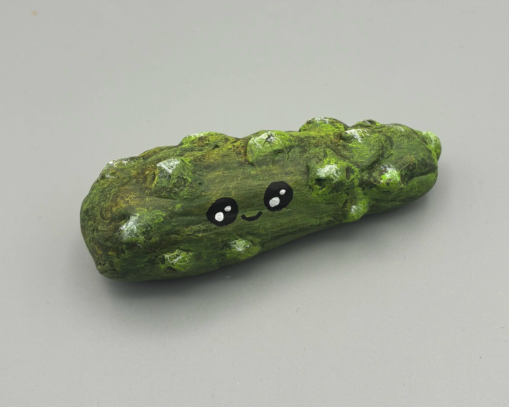 Gherkin pickle cute handmade handpainted clay desk buddy by Devon artist Helen Leslie Illustrator