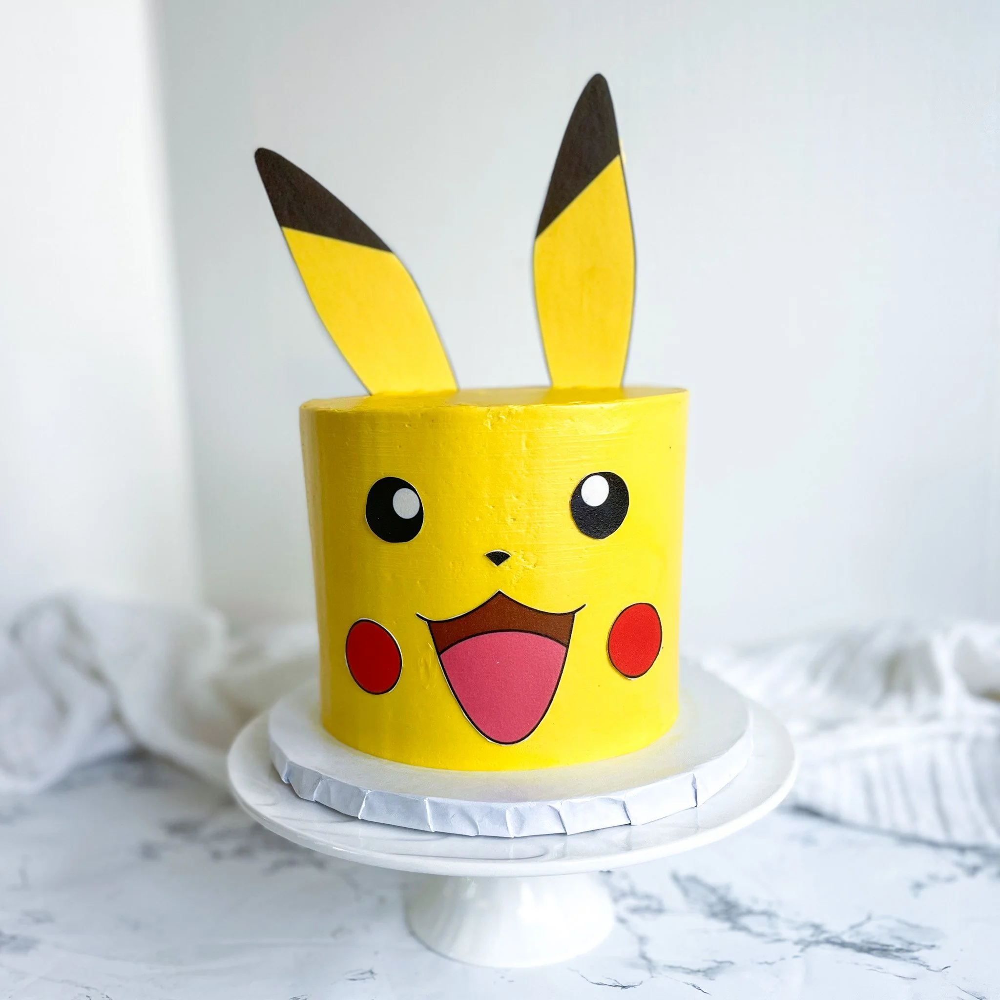✨⚡️ Pika Pika&hellip; Party Time! ⚡️✨

How cute is this Pikachu cake?! 🎂🐭⚡️ Perfect for a Pok&eacute;mon-loving kiddo ready to celebrate in sweet style. From the bright yellow frosting to those iconic ears (which are edible!), this one was such a f
