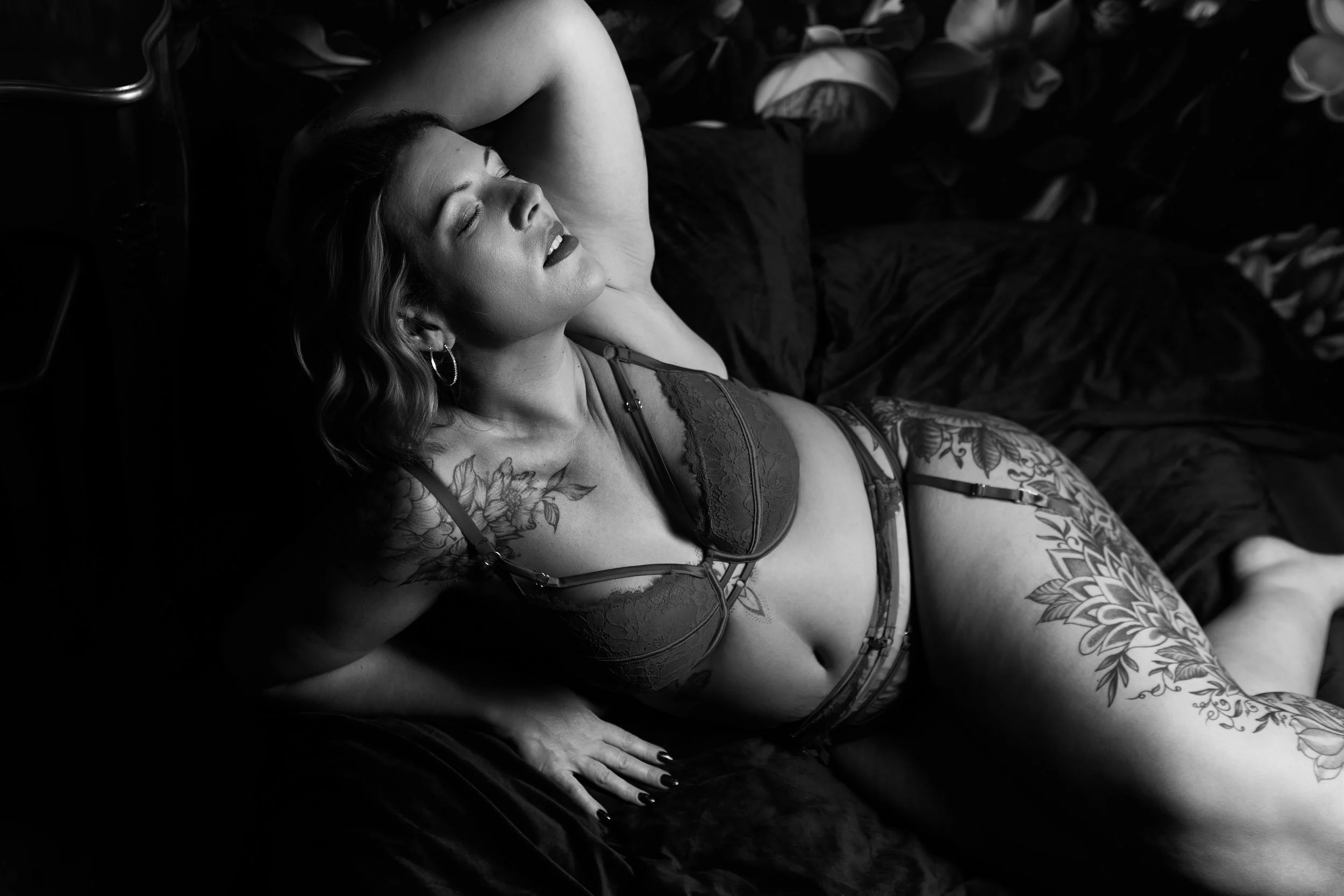 Boudoir portrait celebrating self-love and feminine strength