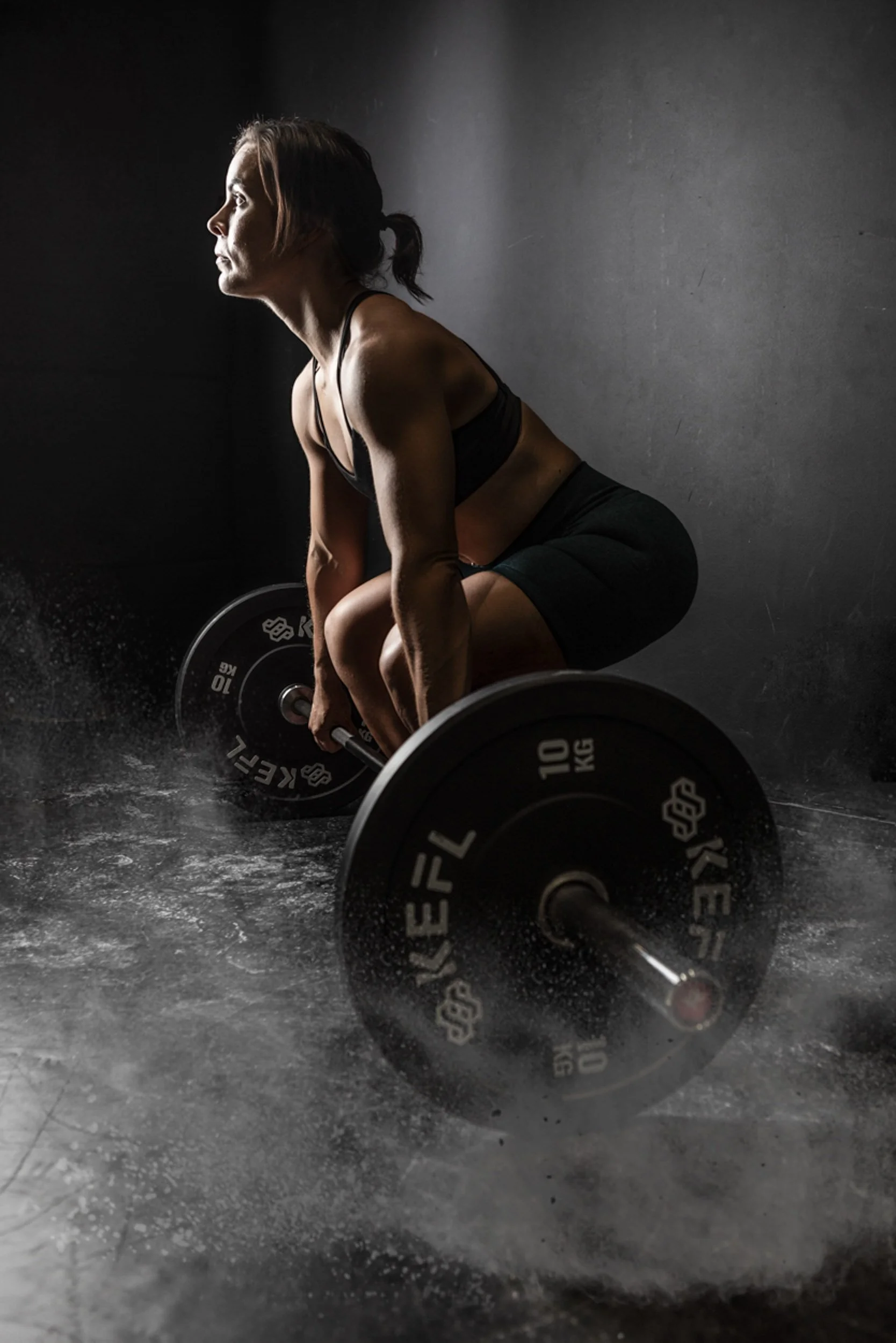 Diverse woman celebrating body positivity in boudoir shoot