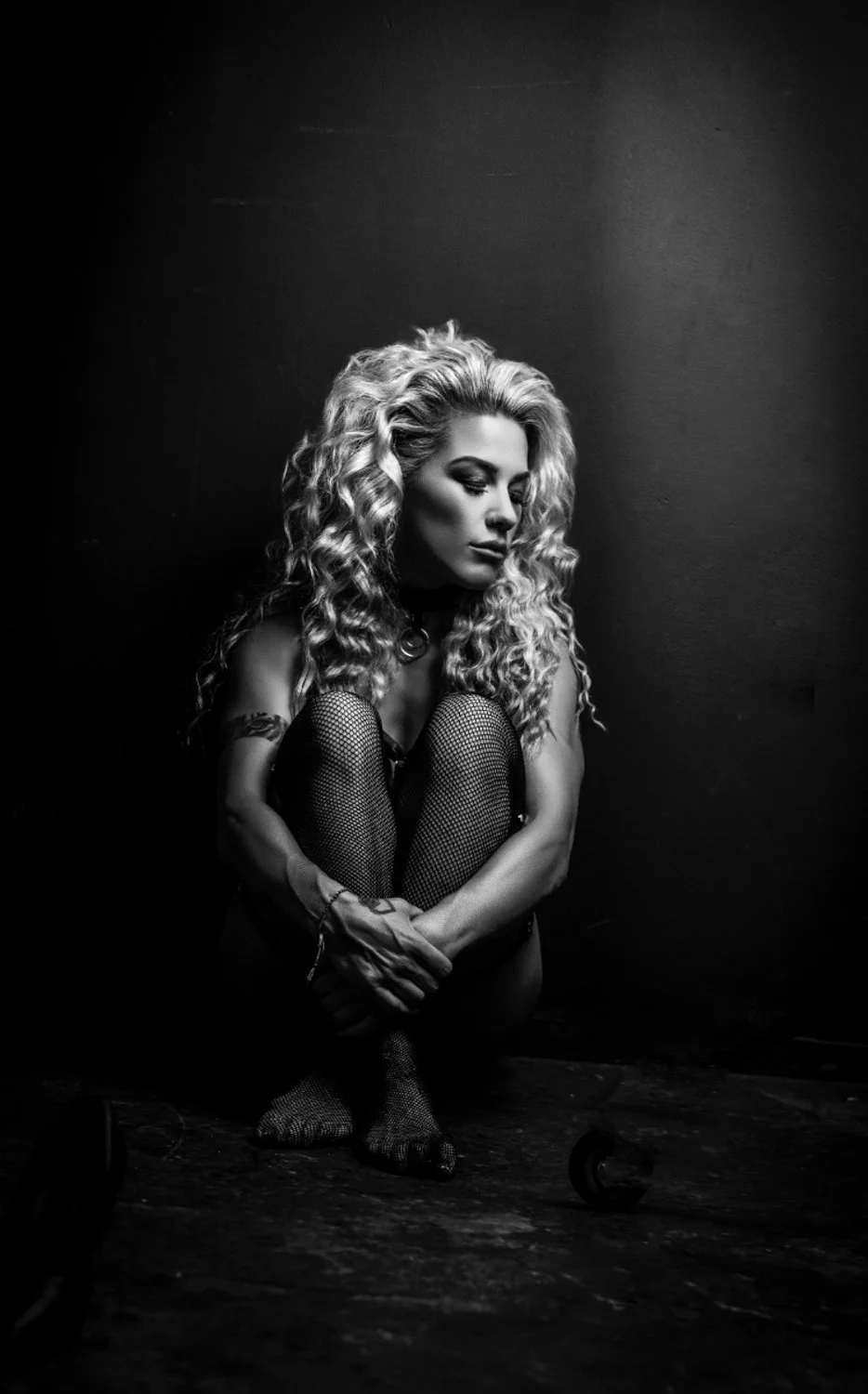 Confident woman embracing independence and strength with chain styling