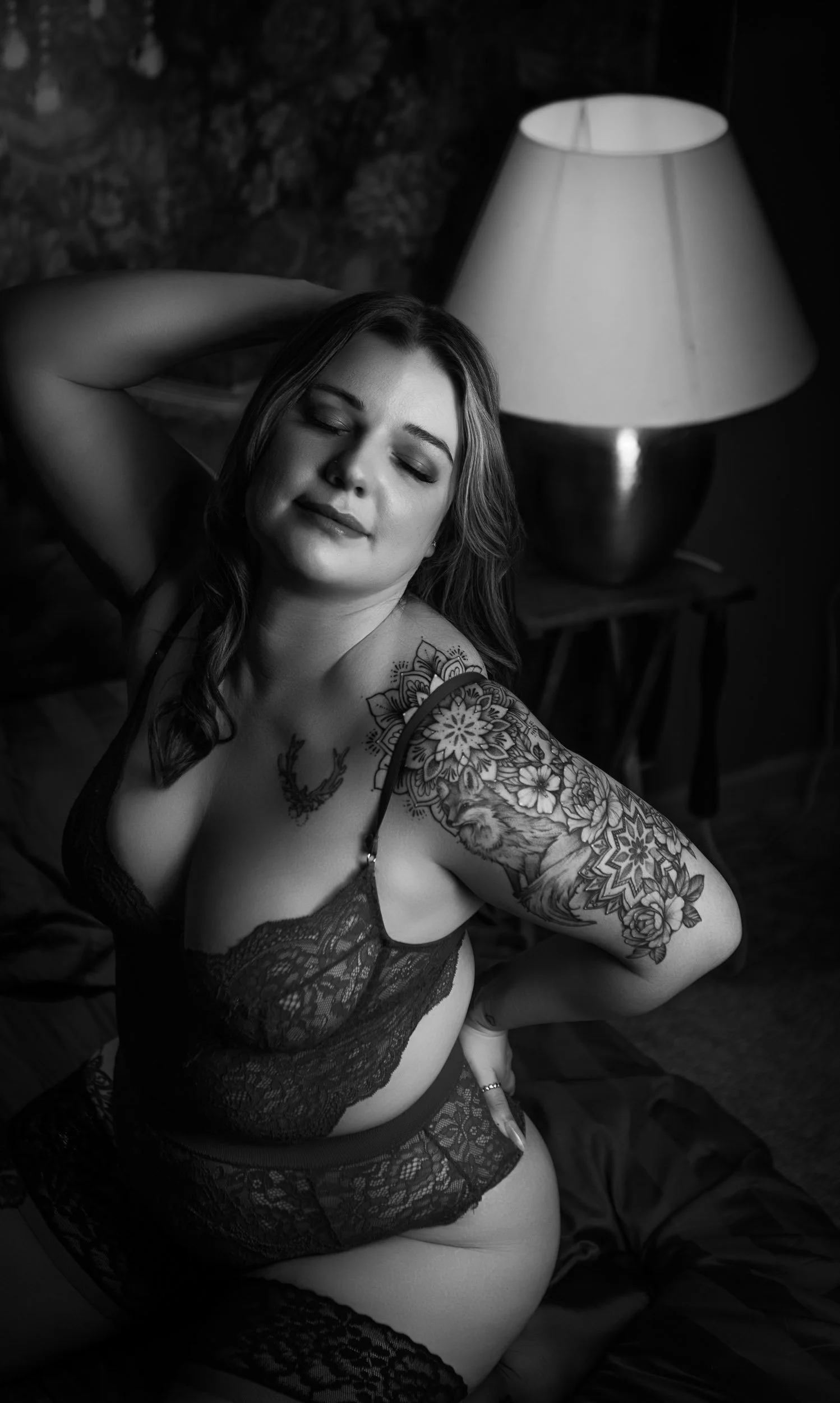 Confident woman expressing self-acceptance in intimate setting