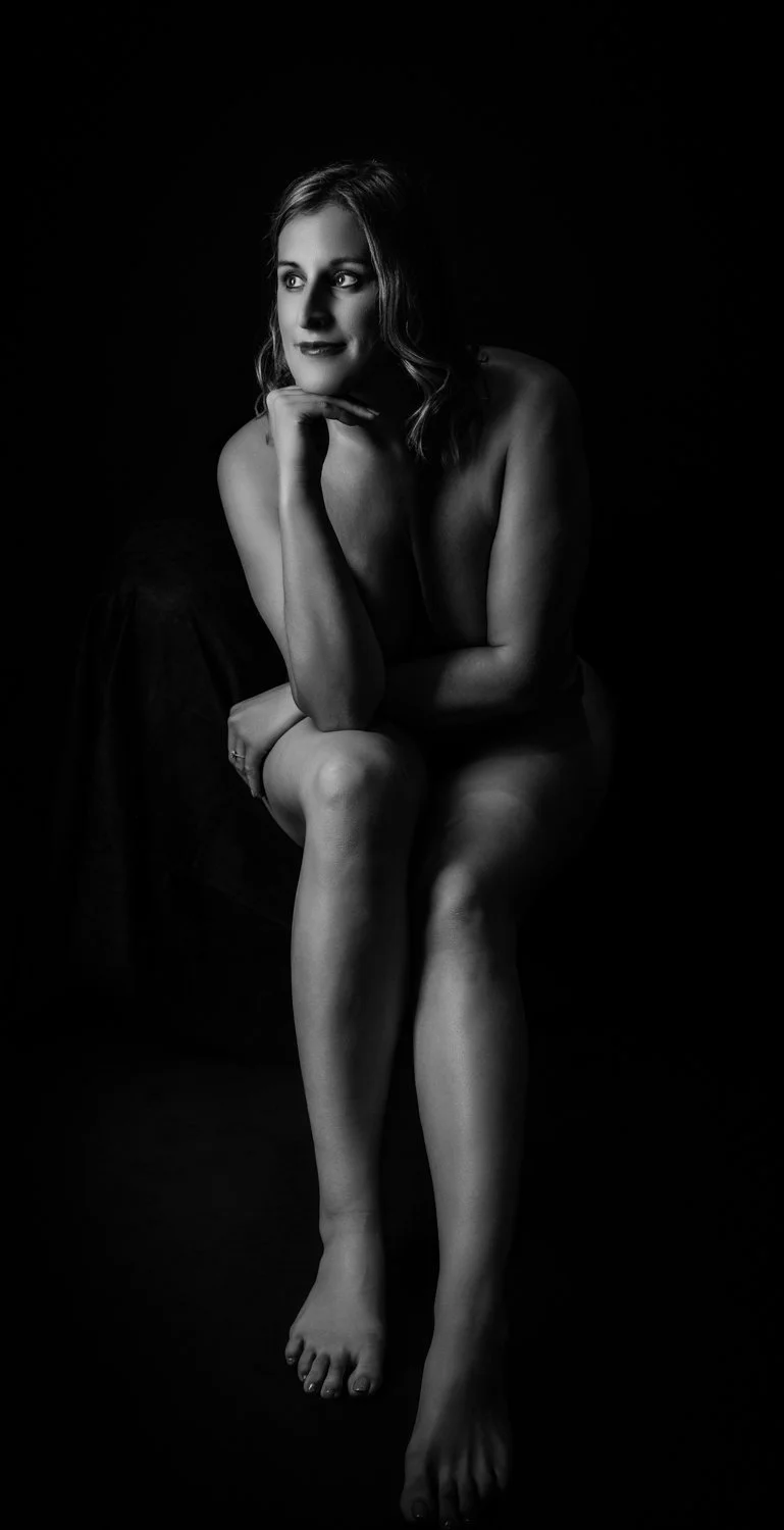 Boudoir portrait celebrating self-love and feminine strength