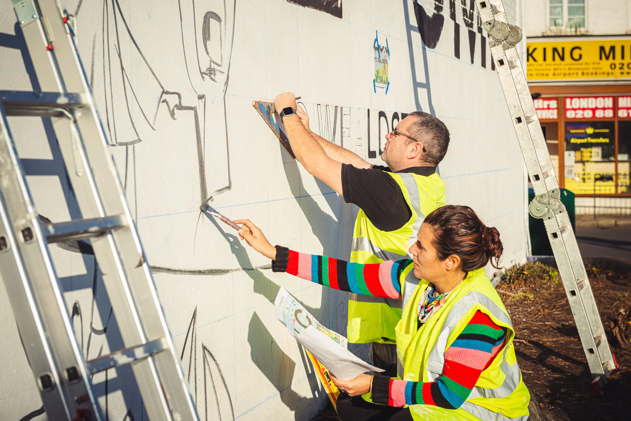 Wealdstone-handpainted-mural-wetheseedscreative-harrowcouncil-art-welcome-sign