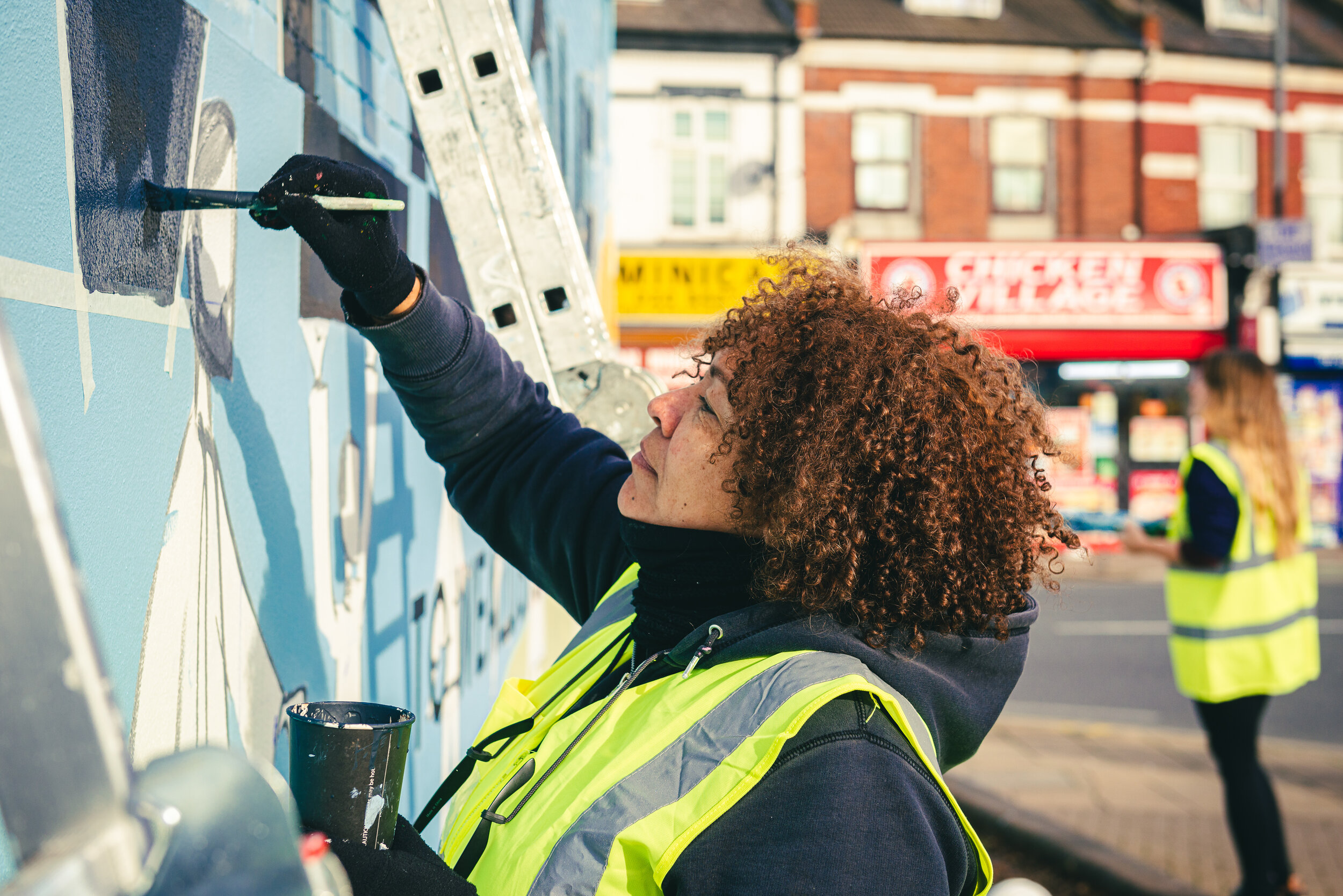 Wealdstone-handpainted-mural-wetheseedscreative-harrowcouncil-art-welcome-sign