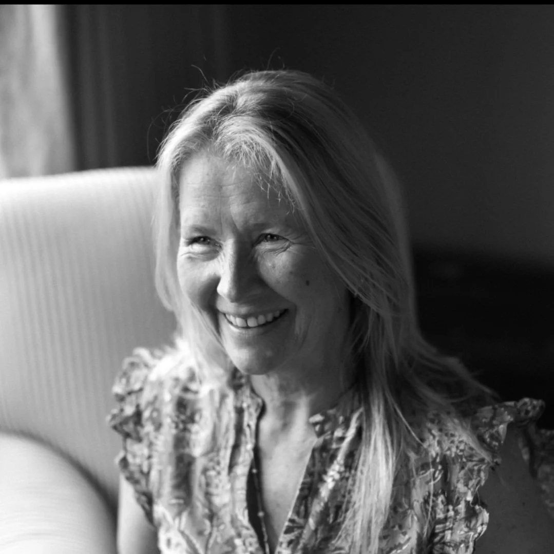 Lady smiling in black and white headshot
