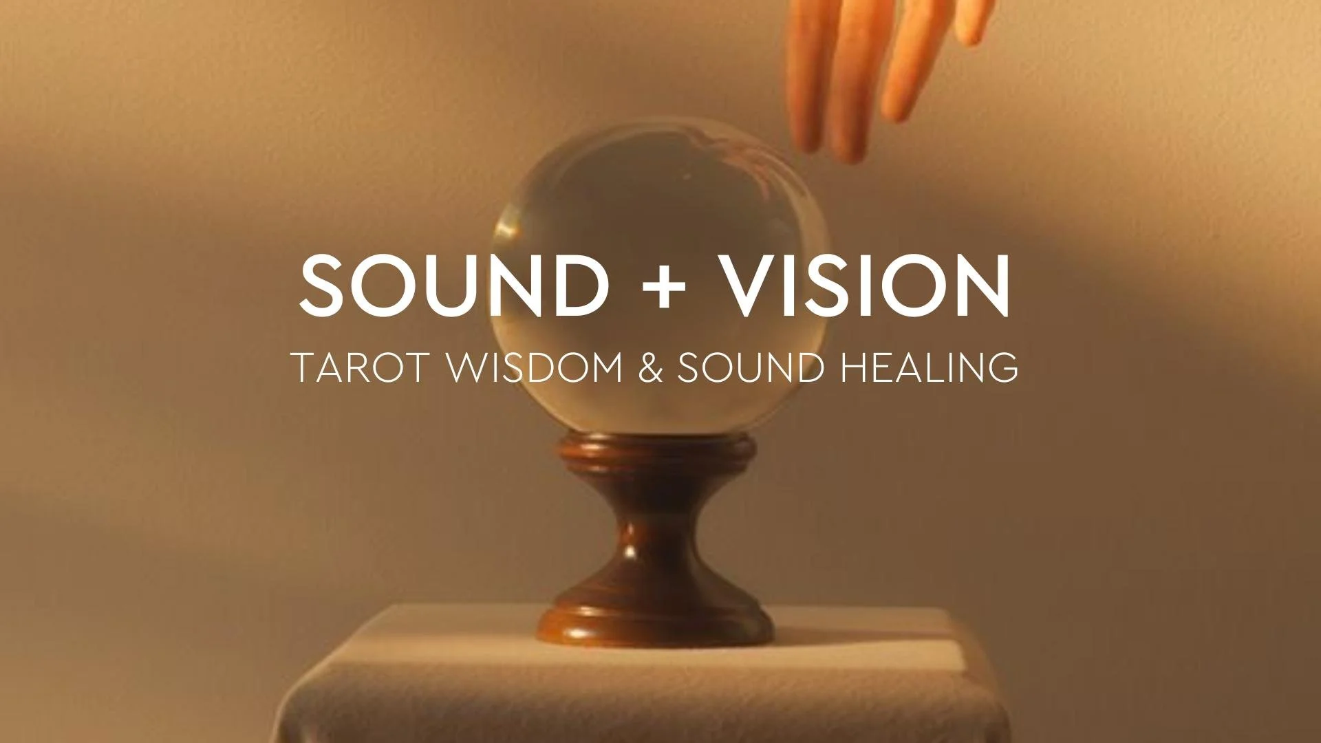 crystal ball on wooden stand on a stand with hand close