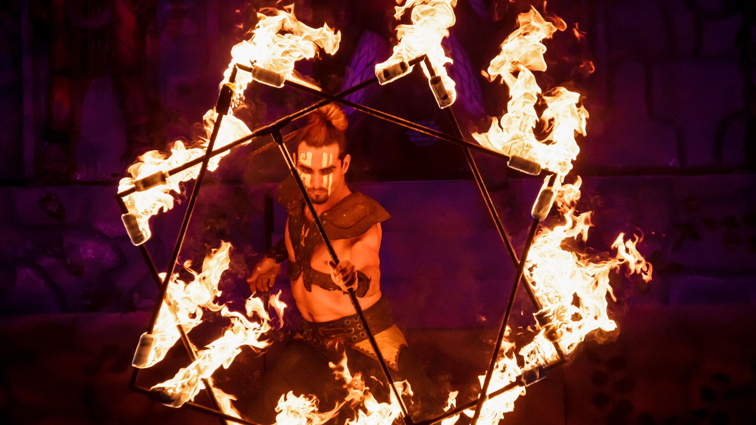 Tribal Inferno Mayan Fire Dancer with Face Painting and Burning Firestar, Luxury Resort and Hotel Entertainment, Cancun, Mexico