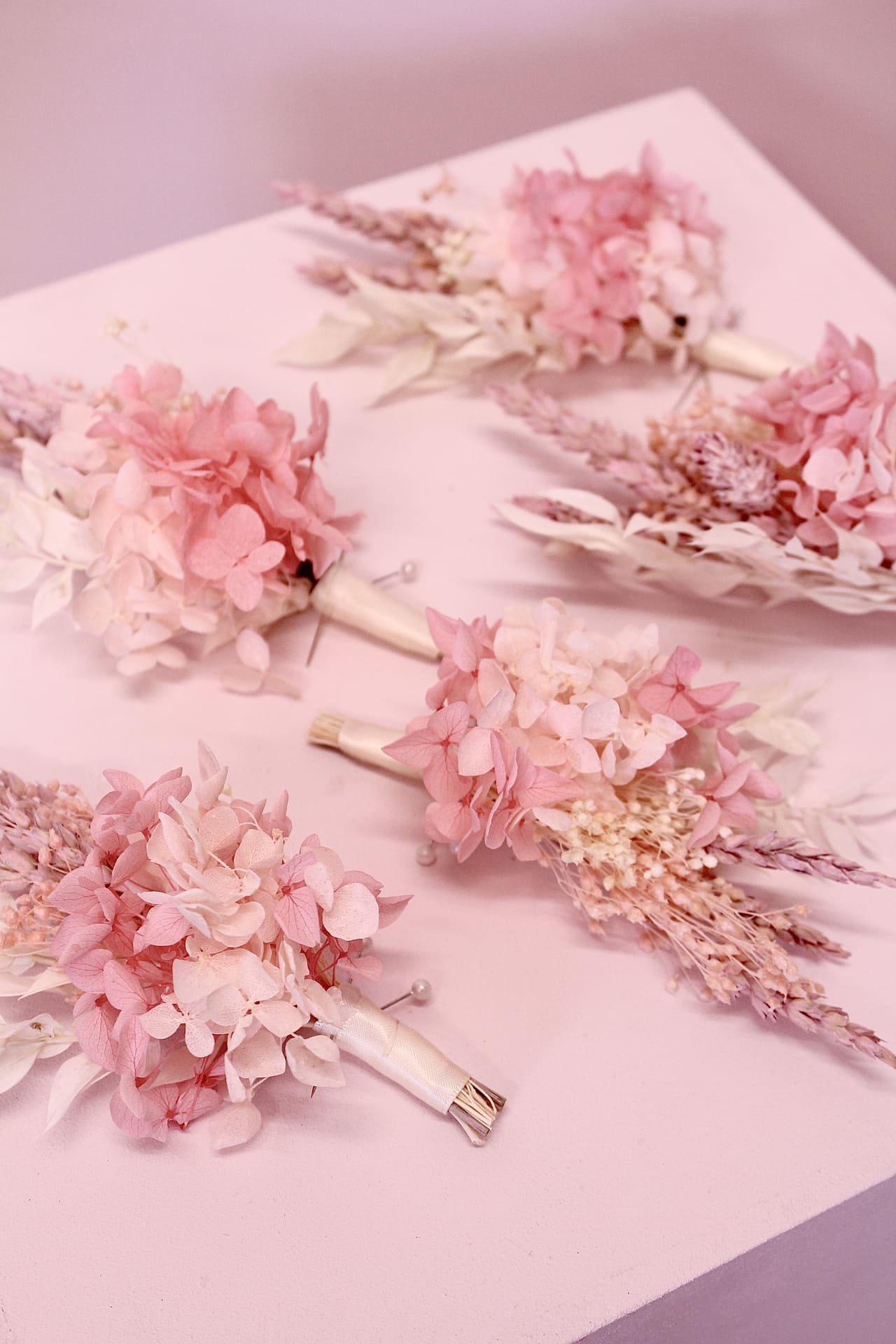 pink dried flower buttonholes