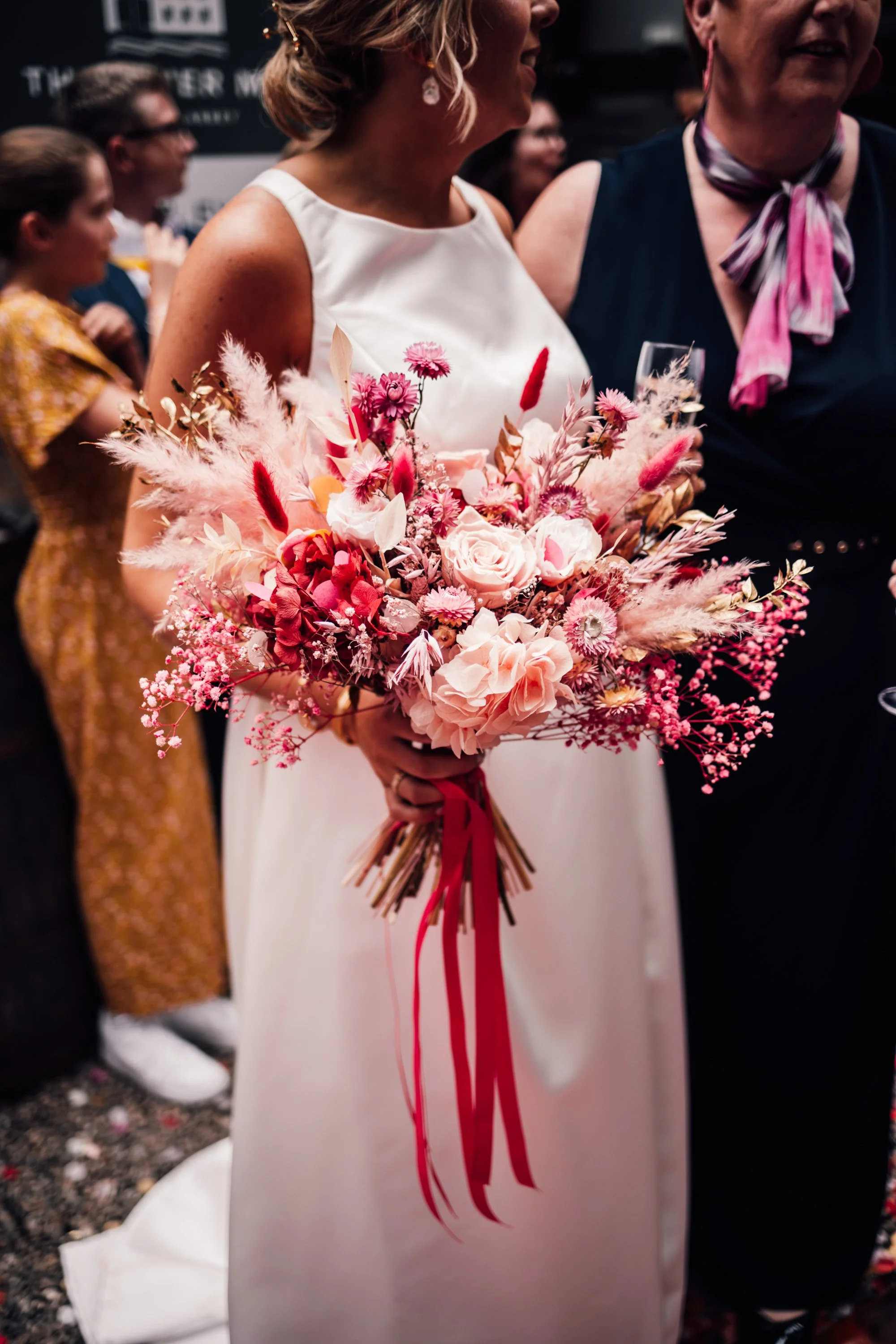 dried pink wedding flowers with pampas