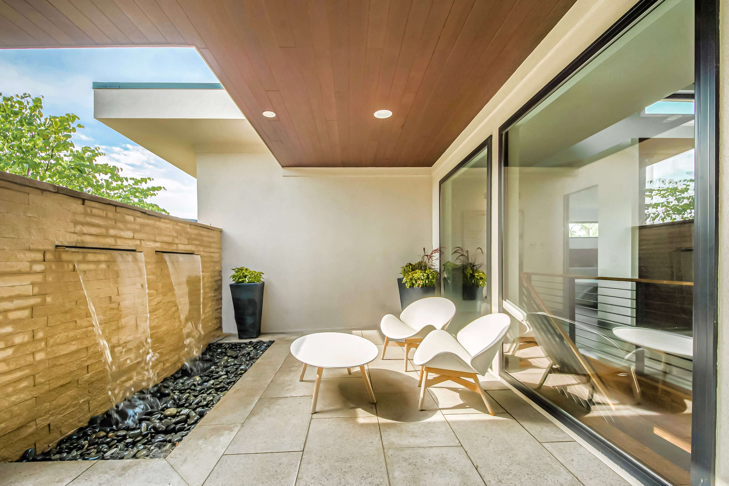 private entryway with waterfall