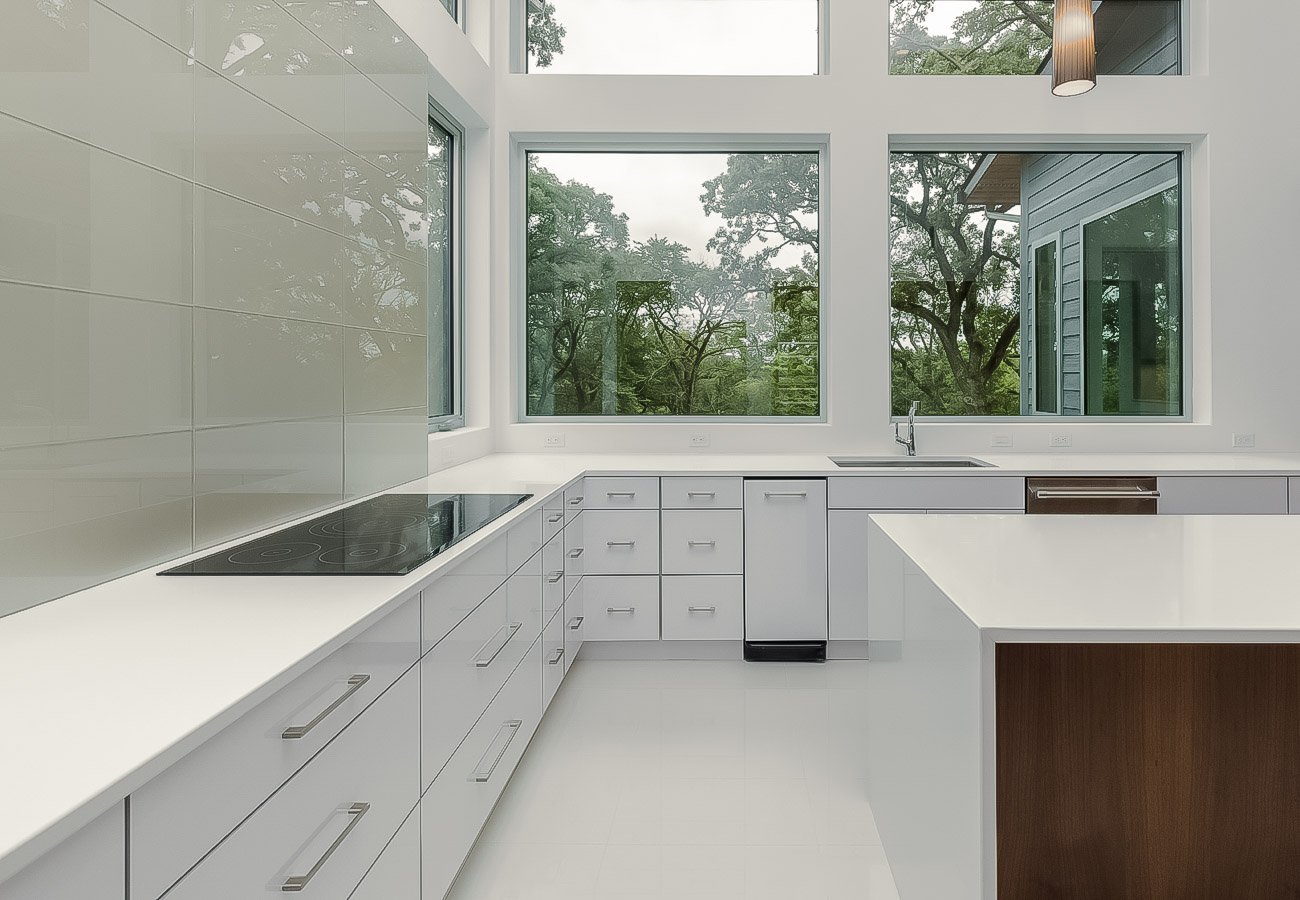 high-gloss kitchen with wooded trees