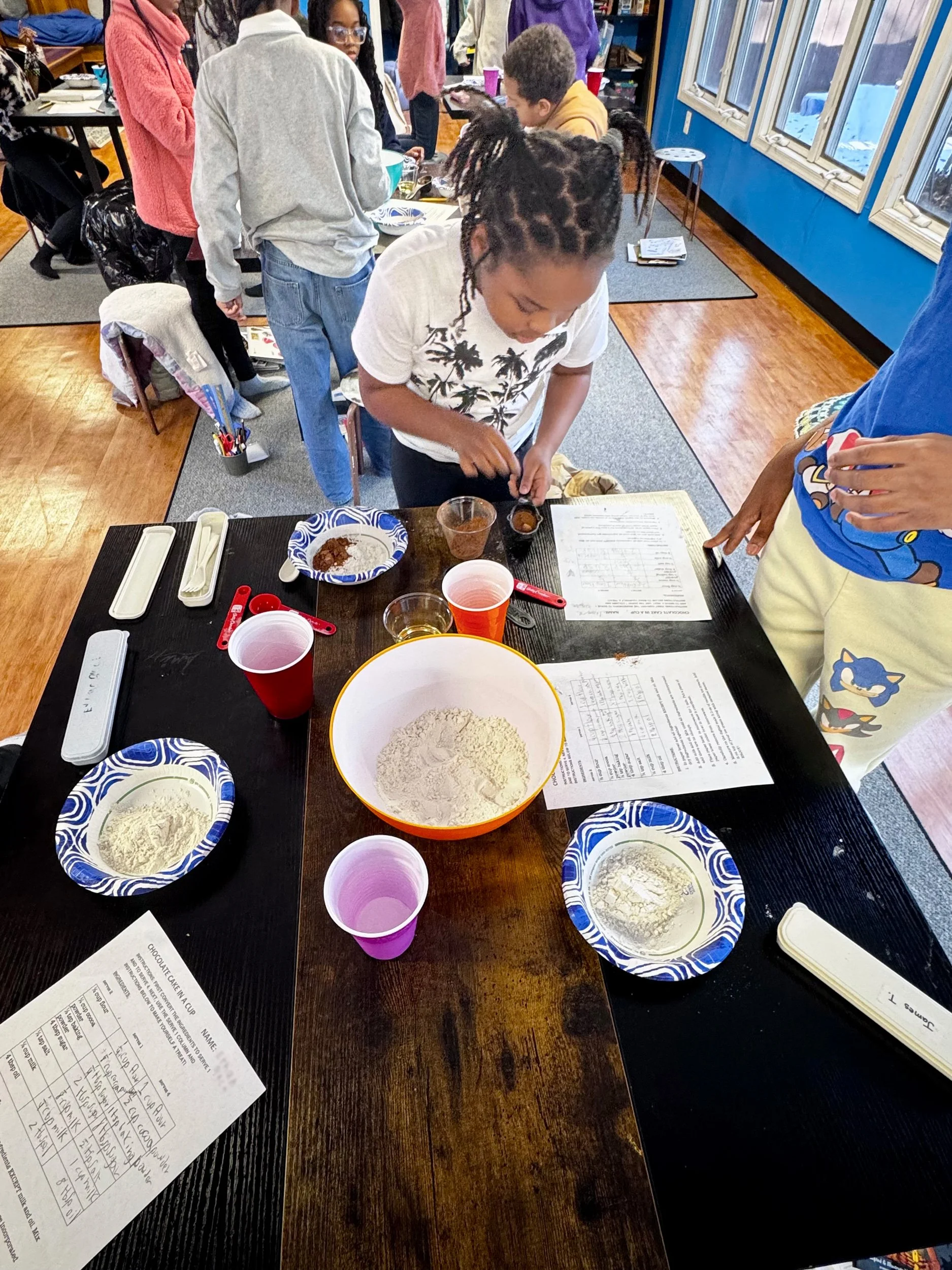 Learning about conversions while making cake in a bowl.