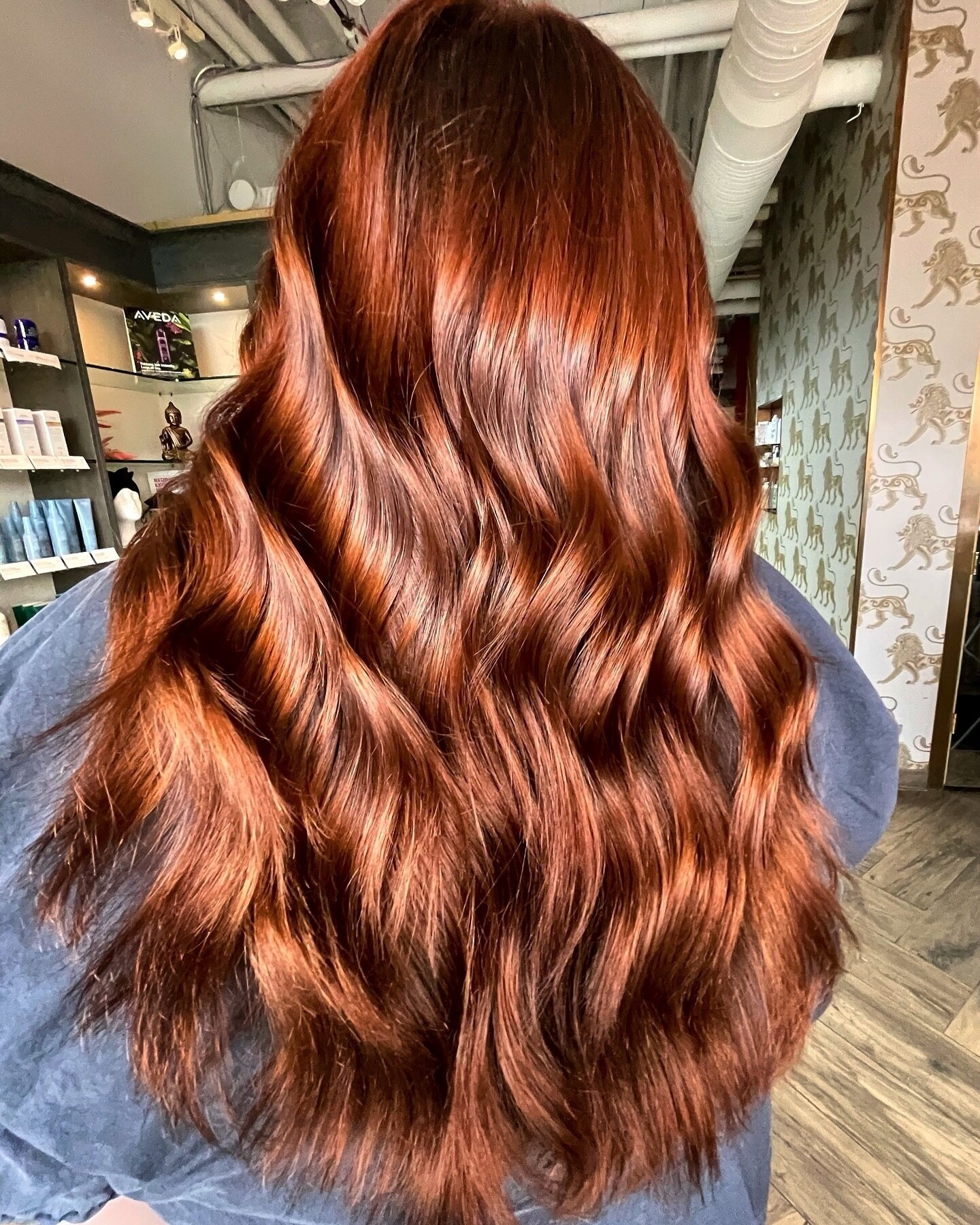 Crazy how a quick toner can make the hair look brand new 😍⁠
⁠
She asked for more red so we gave her more RED ❤️⁠
⁠
Hair by Graduate Stylist Jessy @hairstyledbyjessy at our West 85th location.