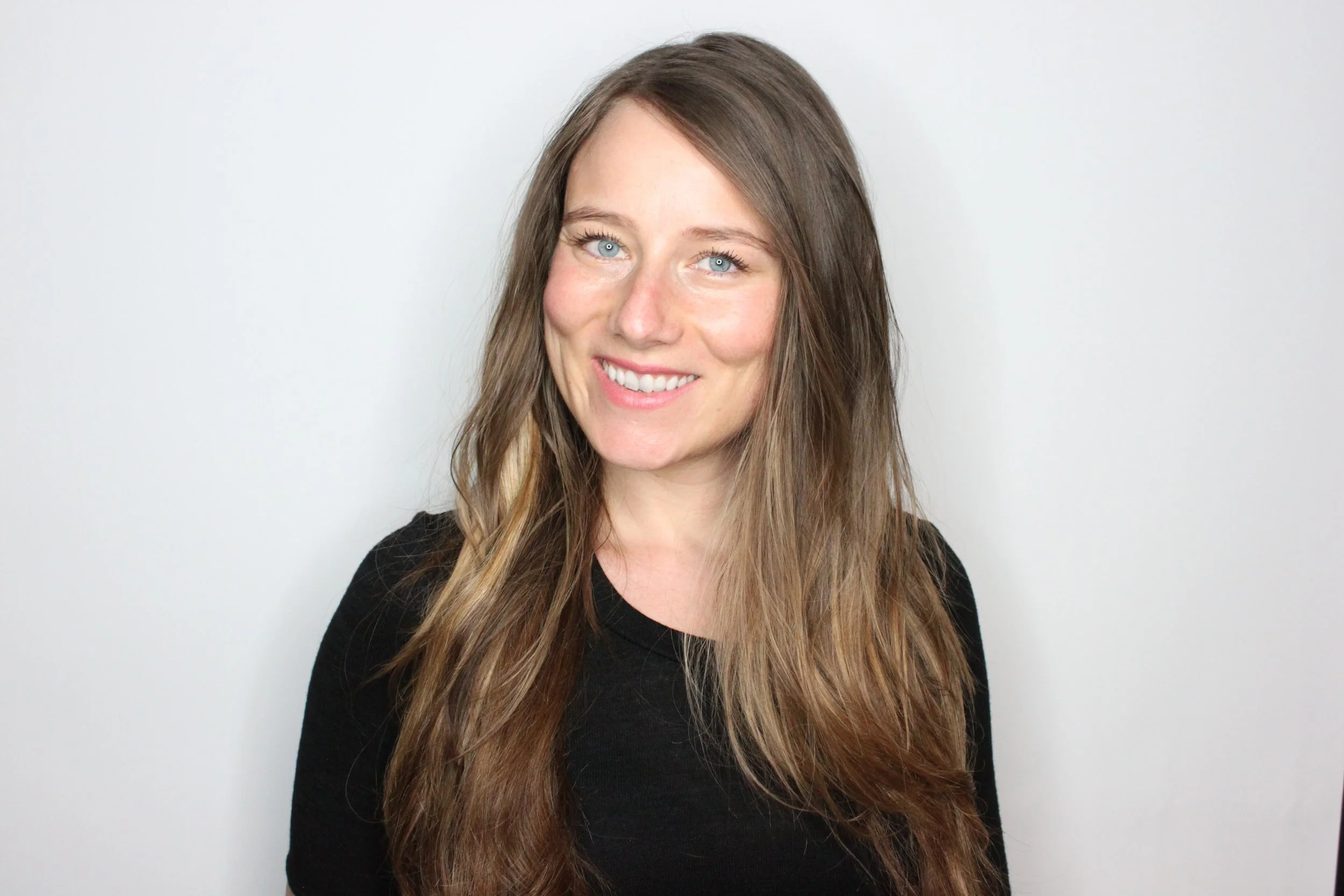picture of genna, operations manager and master stylist at RedBloom Salon