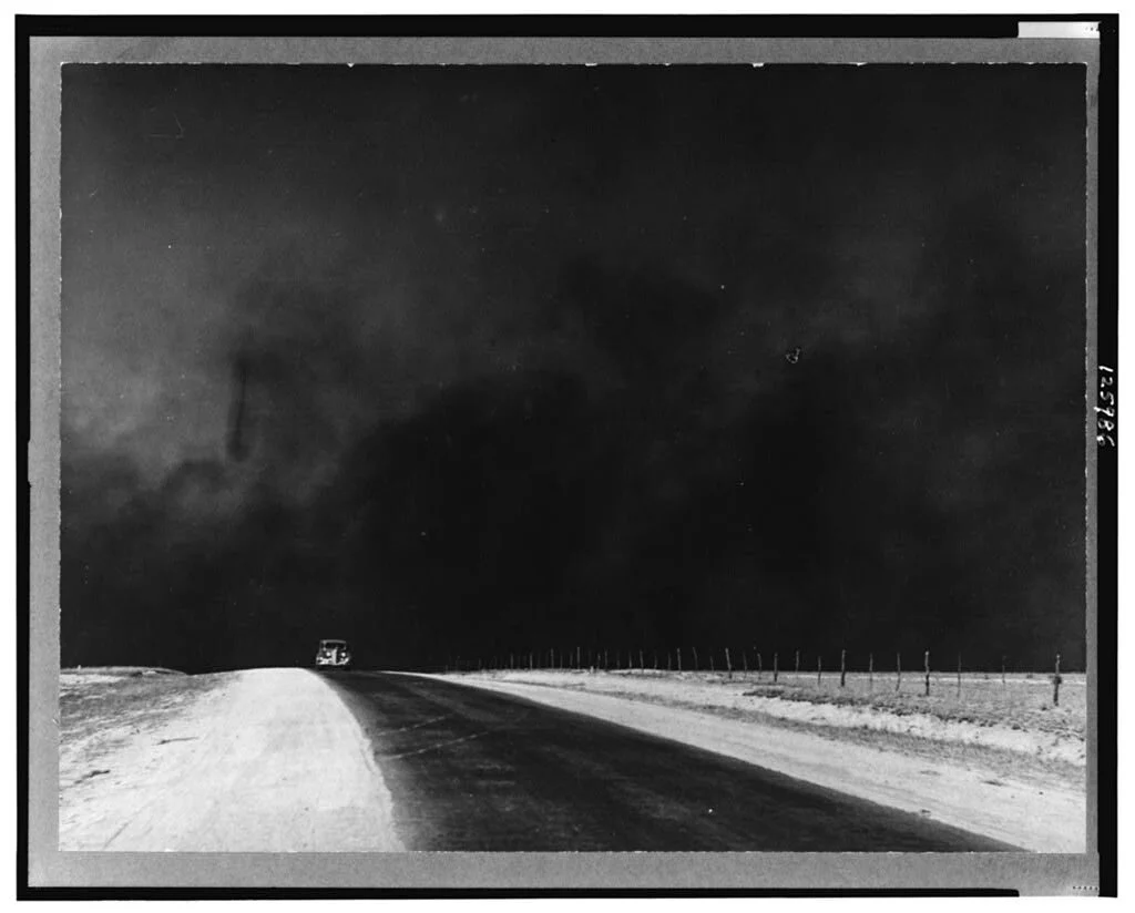 Heavy black clouds of dust rising over the Texas Panhandle. March, 1936. Credit: Arthur Rothstein. LOC ID: cph.3c25986