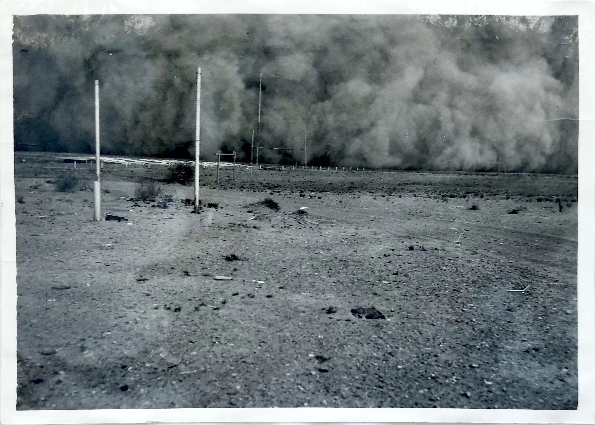 An approaching dust storm at Elkhart, Kansas. May 13, 1940. Figure 1 in "Studies of methods of establishing plant covers for erosion control", c. 1939-1940. National Archives, Record Group 114, Entry 113