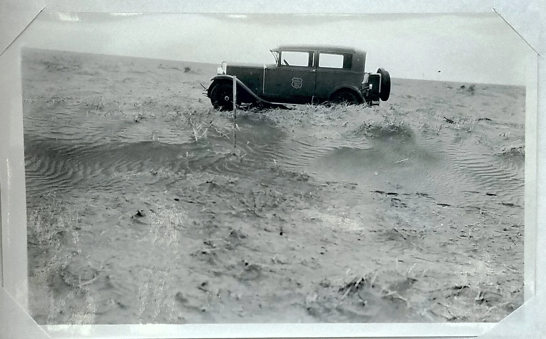 Soil drift in southwestern Kansas that was 30 inches high, 20 feet wide, and 100+ feet long. c. 1933. Figure 13 in Annual Report Bureau of Chemistry and Soils. National Archives, Record Group 114, Entry 109.