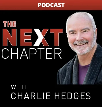 Podcast cover featuring a smiling older man with a beard and bald head, wearing a dark striped blazer and purple shirt, with red and black background and text that reads 'The Next Chapter with Charlie Hedges'.