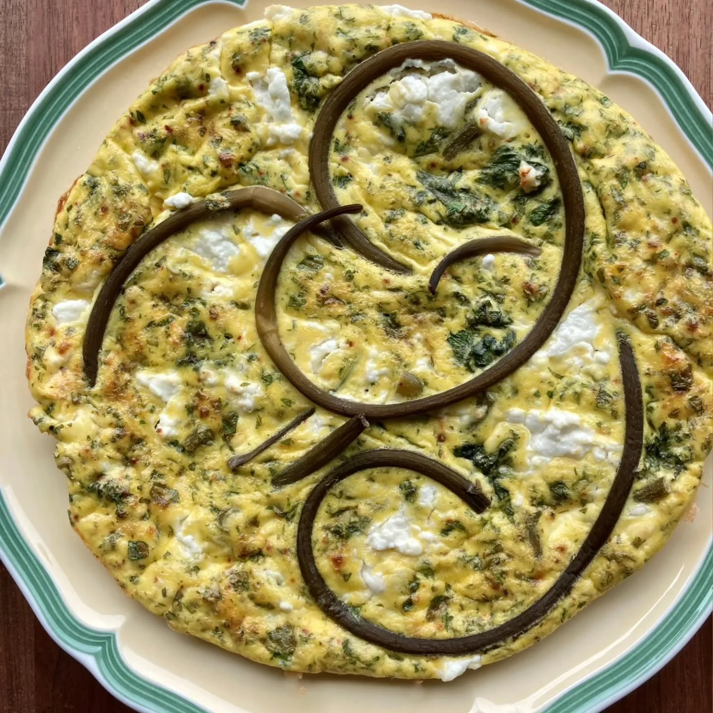 Lately, we&rsquo;ve been reaching for our pickled garlic scapes again.
Local eggs, fresh greens, and a simple frittata.
Made with beautiful local eggs from @springfordfarmeggs 🥚
This recipe favourite can be found on our website.

#vancouverislandfoo