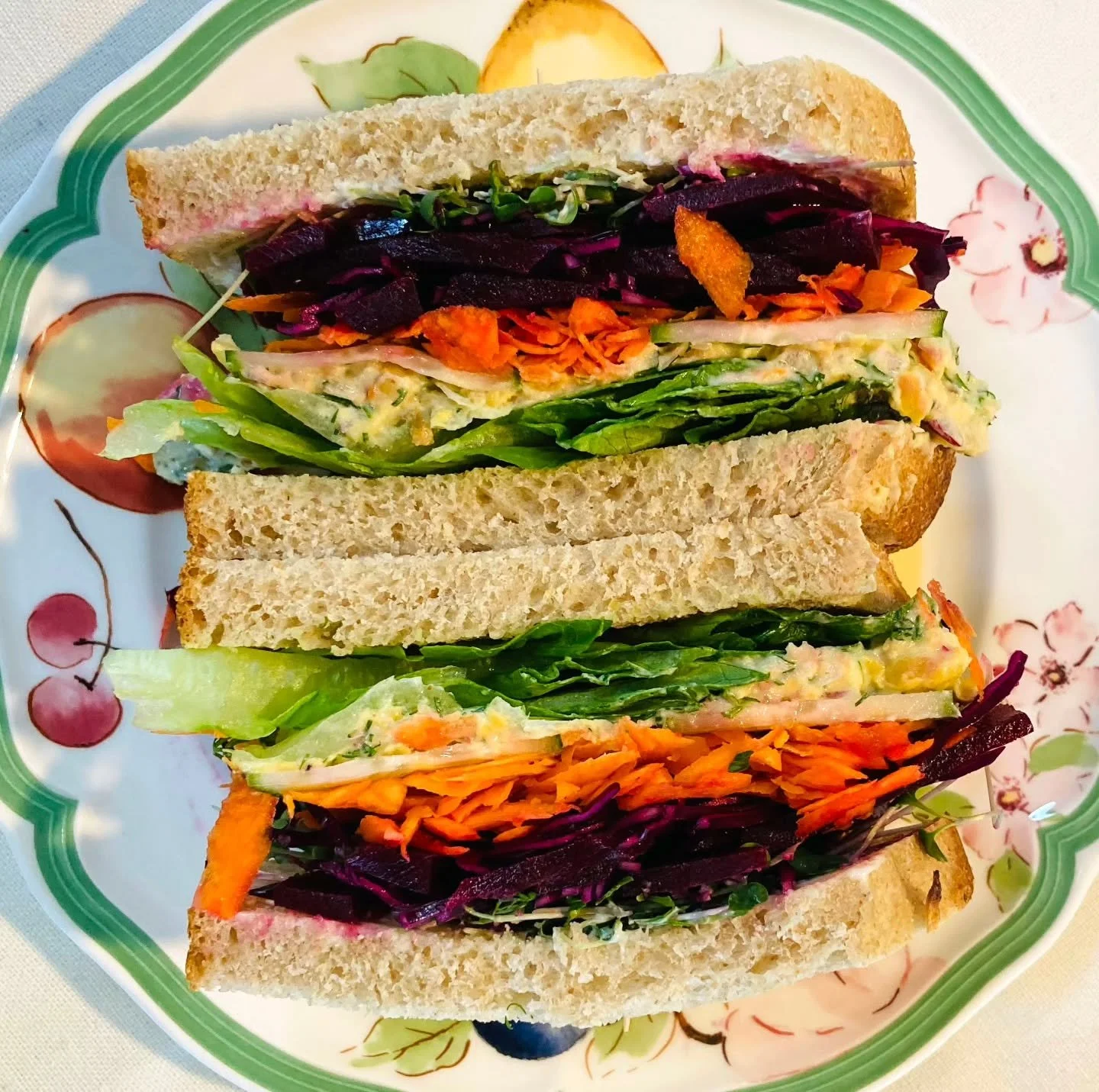 Colourful, creamy, crunchy&mdash;and built with intention.
This veggie sandwich layers chickpea salad, pickled beet and cabbage slaw, fresh greens, and a hearty slice of bread to hold it all together.
It&rsquo;s simple, flexible, and easy to make you
