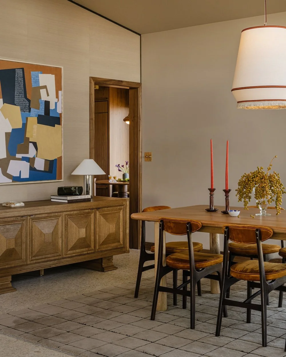 Midcentury dining room with grasscloth wallpaper.jpg