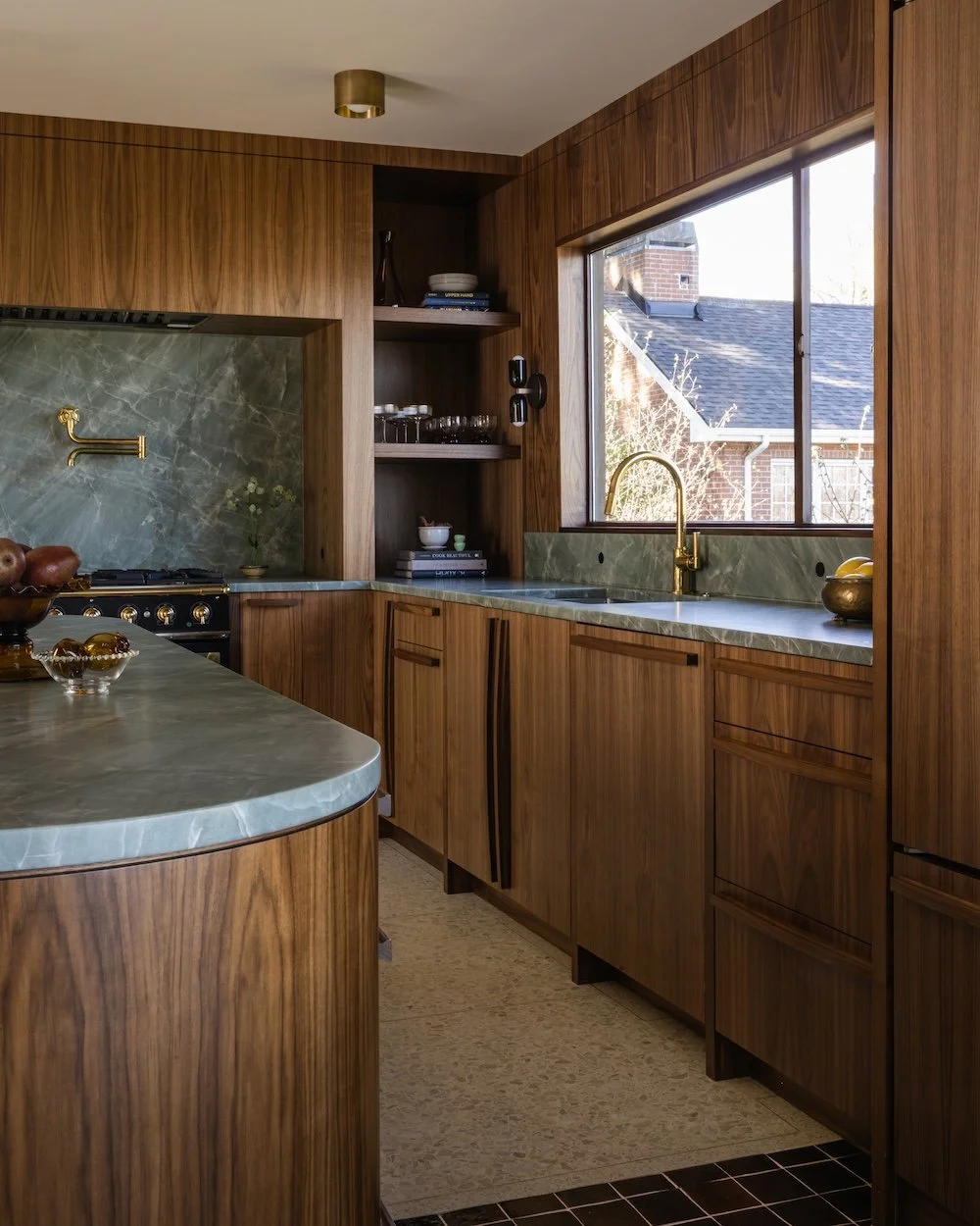 Midcentury modern walnut kitchen with brass accents.jpg