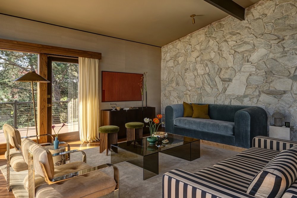 Midcentury modern living room with blue velvet sofa.jpg