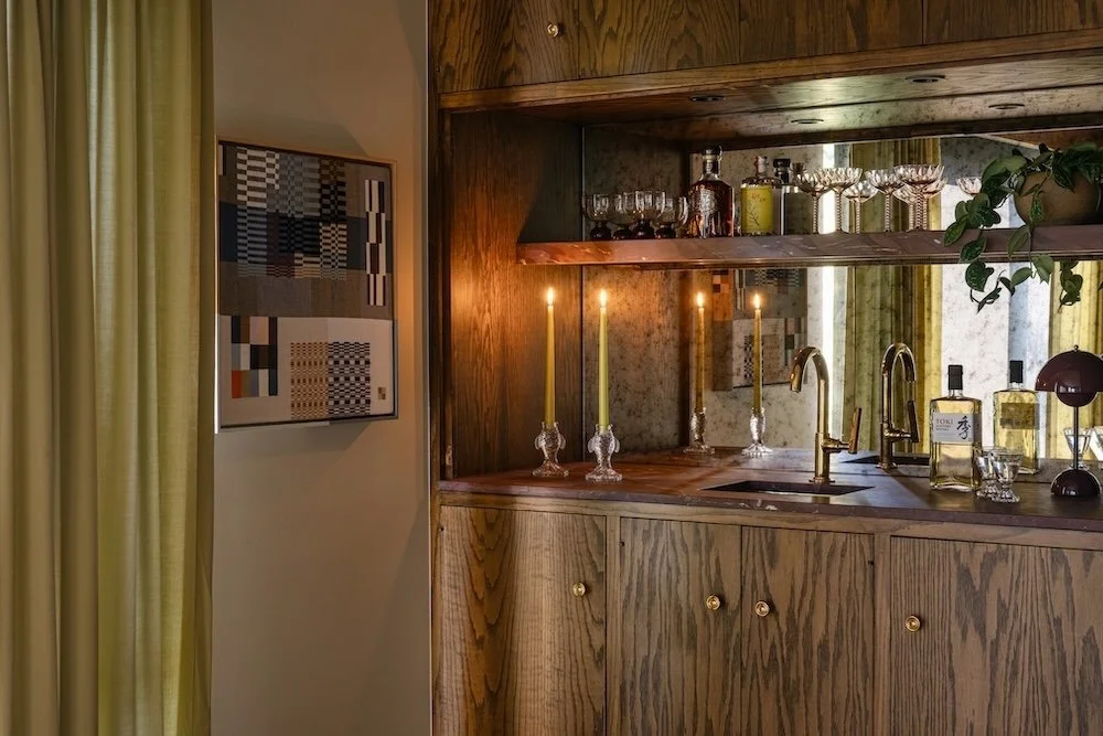 Wood bar with mirrored backsplash.jpg