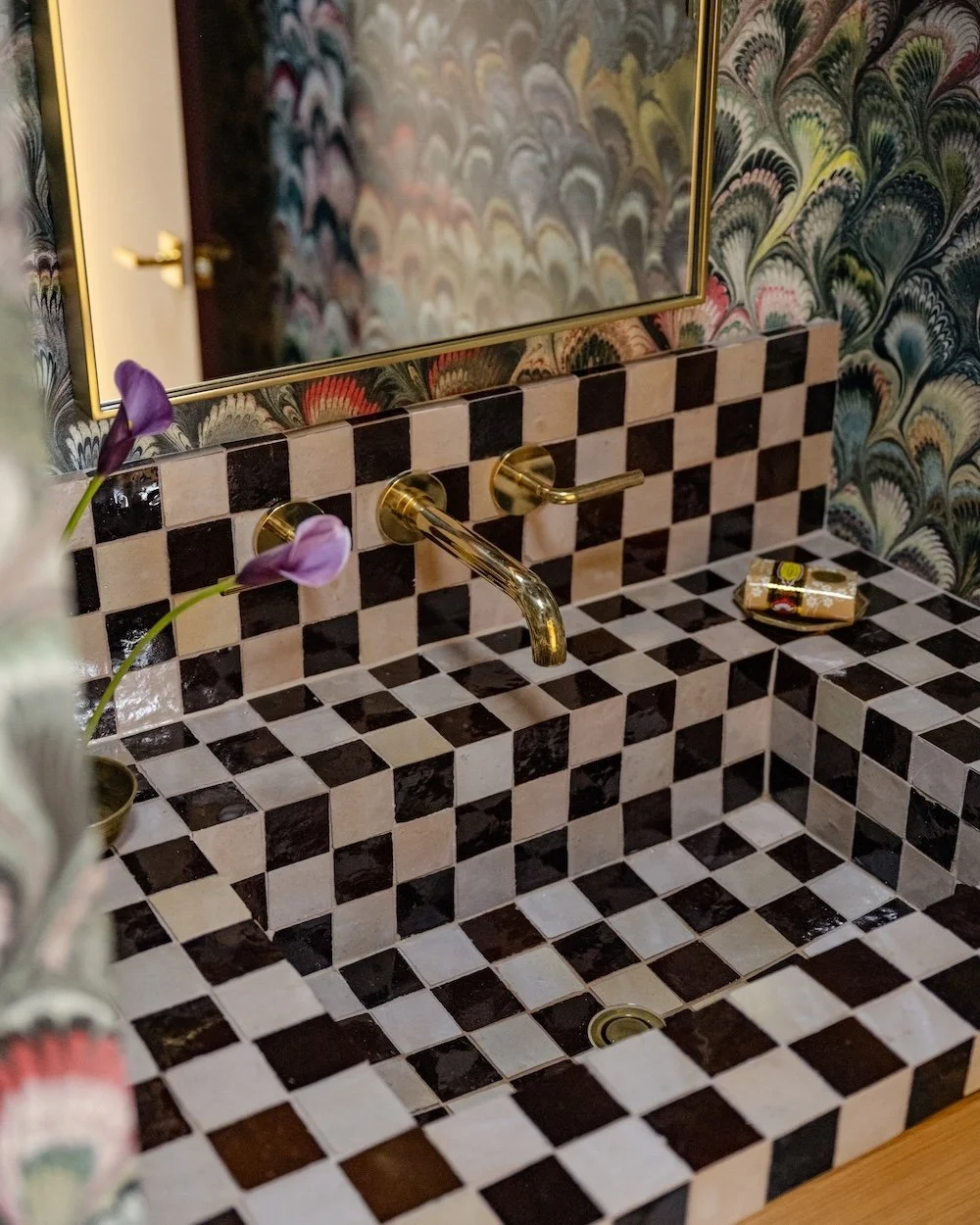 Powder room with mitered tile sink.jpg