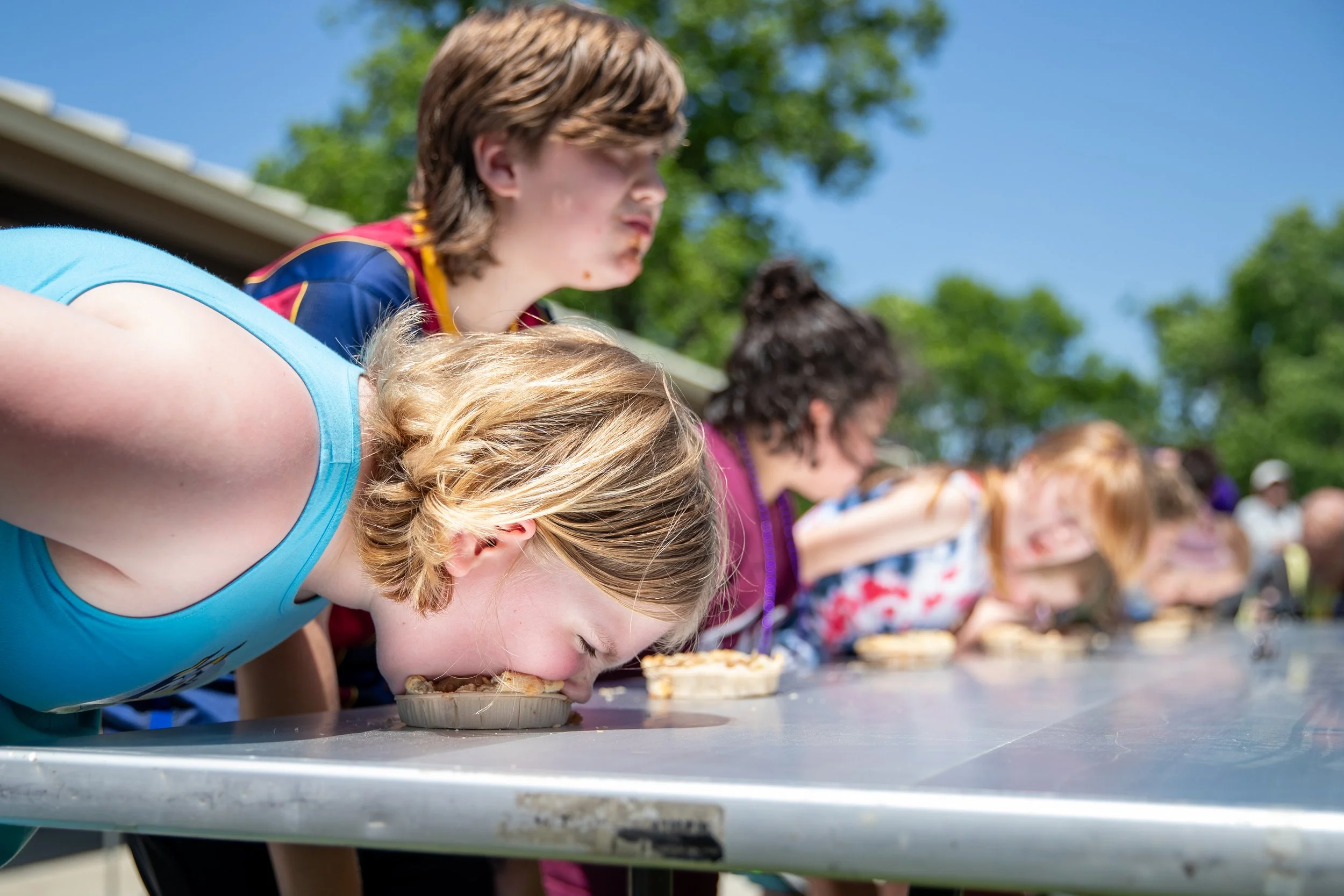 Emily Markham, 10, competes in the first ever Turkey Creek Festival Pie Eating Contest.