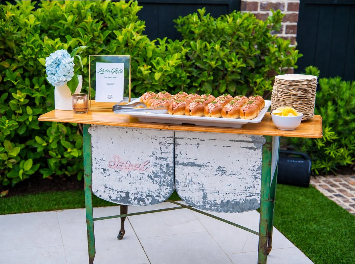 Luxury lobster roll cart styled for a Charleston private event by Sweet Mae’s with mini lobster rolls and coastal event design