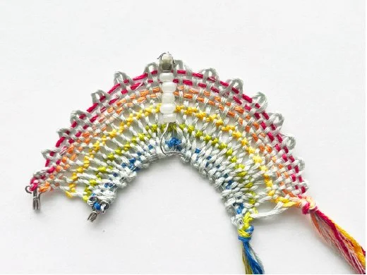 Interactive Bobbin Lace: Metal Thread History, Interviews with Lacemakers, and Material Explorations with E-textiles