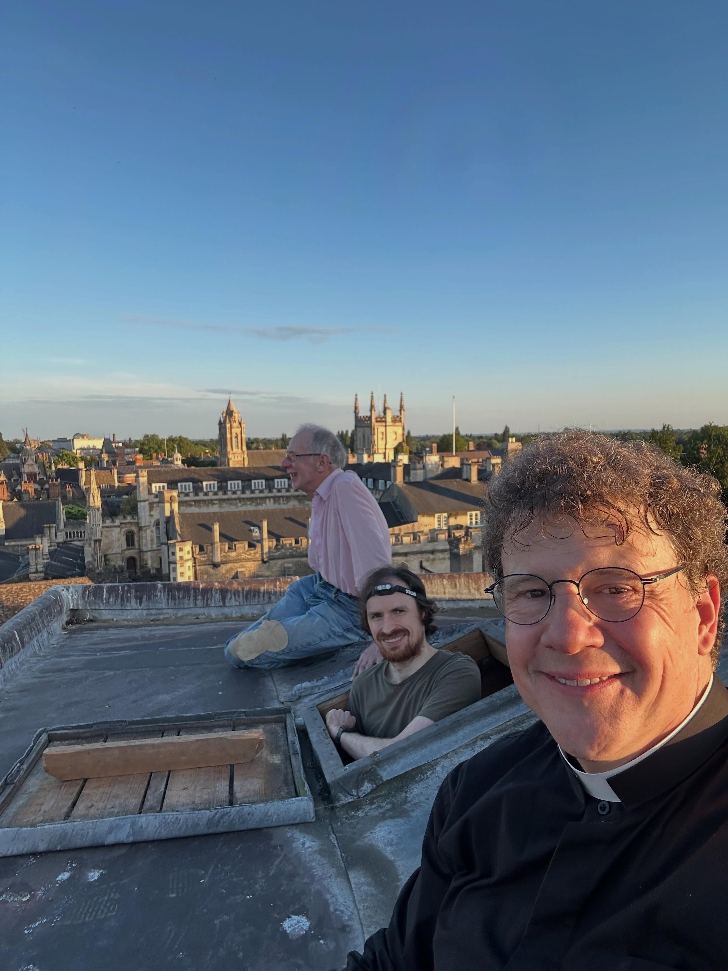 Inspecting the bells and admiring the view atop our 1000 year old tower on this beautiful May evening. If you&rsquo;d like to learn more about ringing at @stbenetscam , do be in touch with us and with @cugcr_bells ! 
#cambridge #ringing #bells