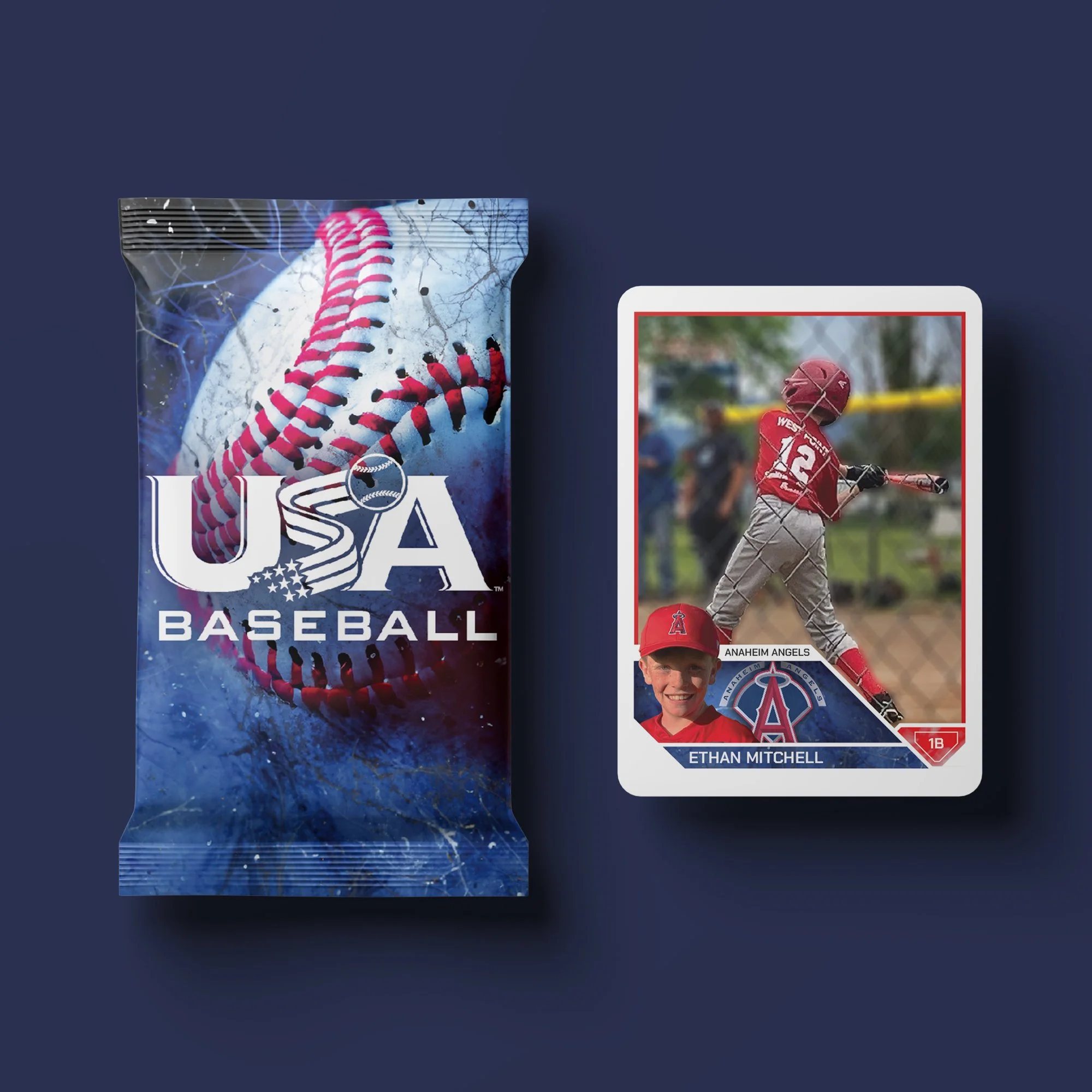 A USA Baseball trading card featuring a young boy in a red uniform swinging a bat at a baseball game, with his name Ethan Mitchell and team Anaheim Angels at the bottom, next to a packet of USA Baseball trading cards.