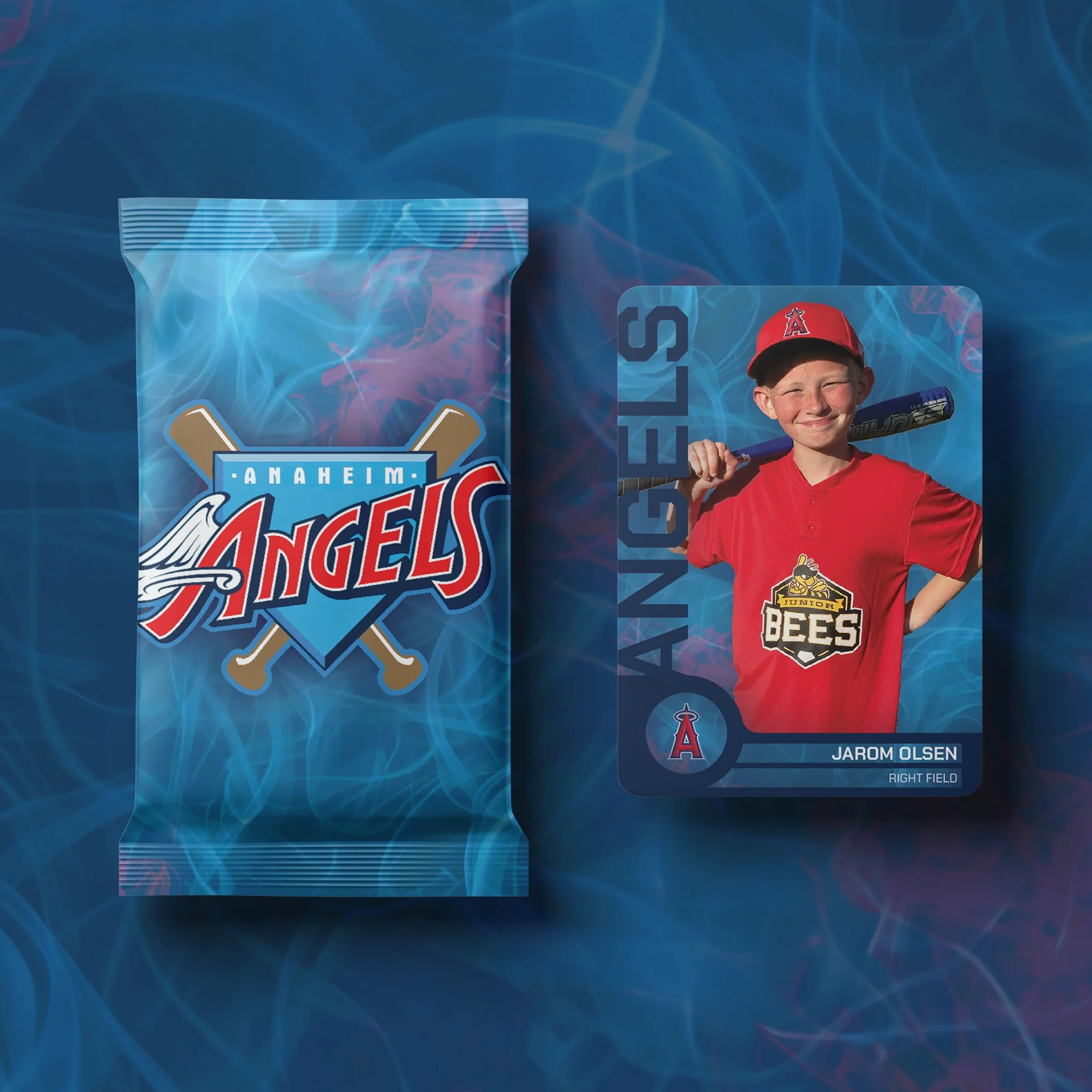 A baseball trading card of a young boy in a red uniform holding a bat, along with a blue packet featuring the Anaheim Angels logo, all displayed against a blue background with swirling light patterns.