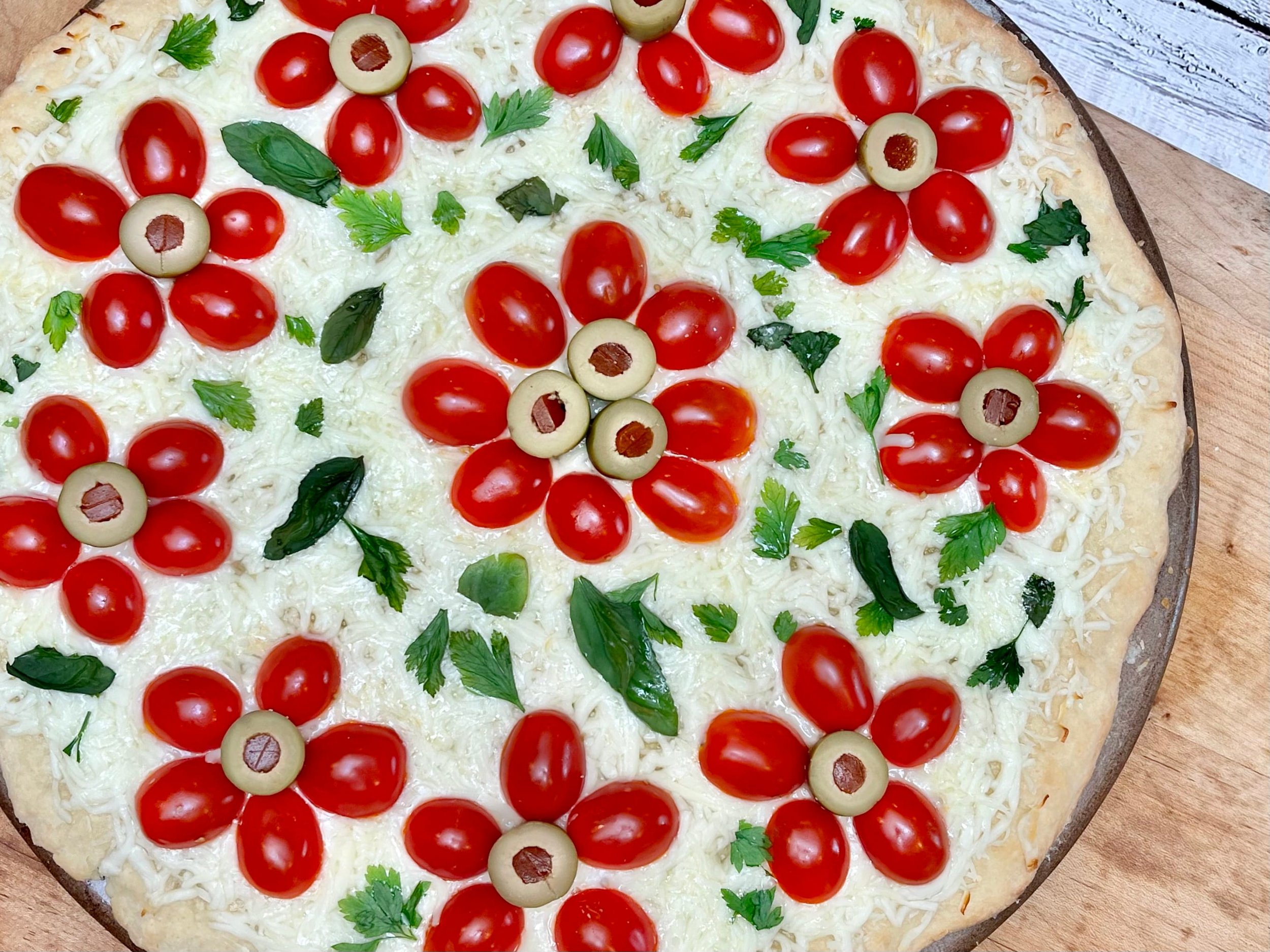 Cherry Tomato Pizza on a cutting board