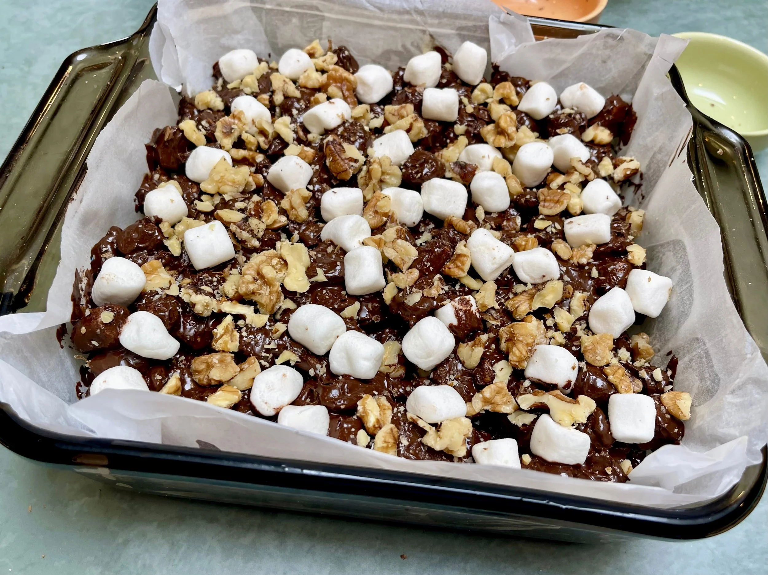 Marshmallow and walnut toppings added