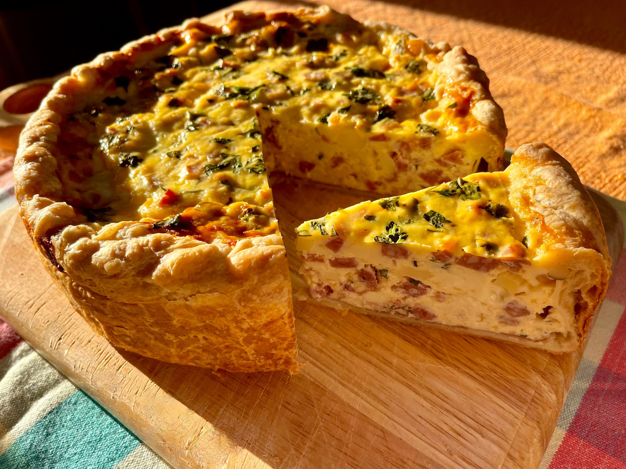 Pizza Rustica with slice removed