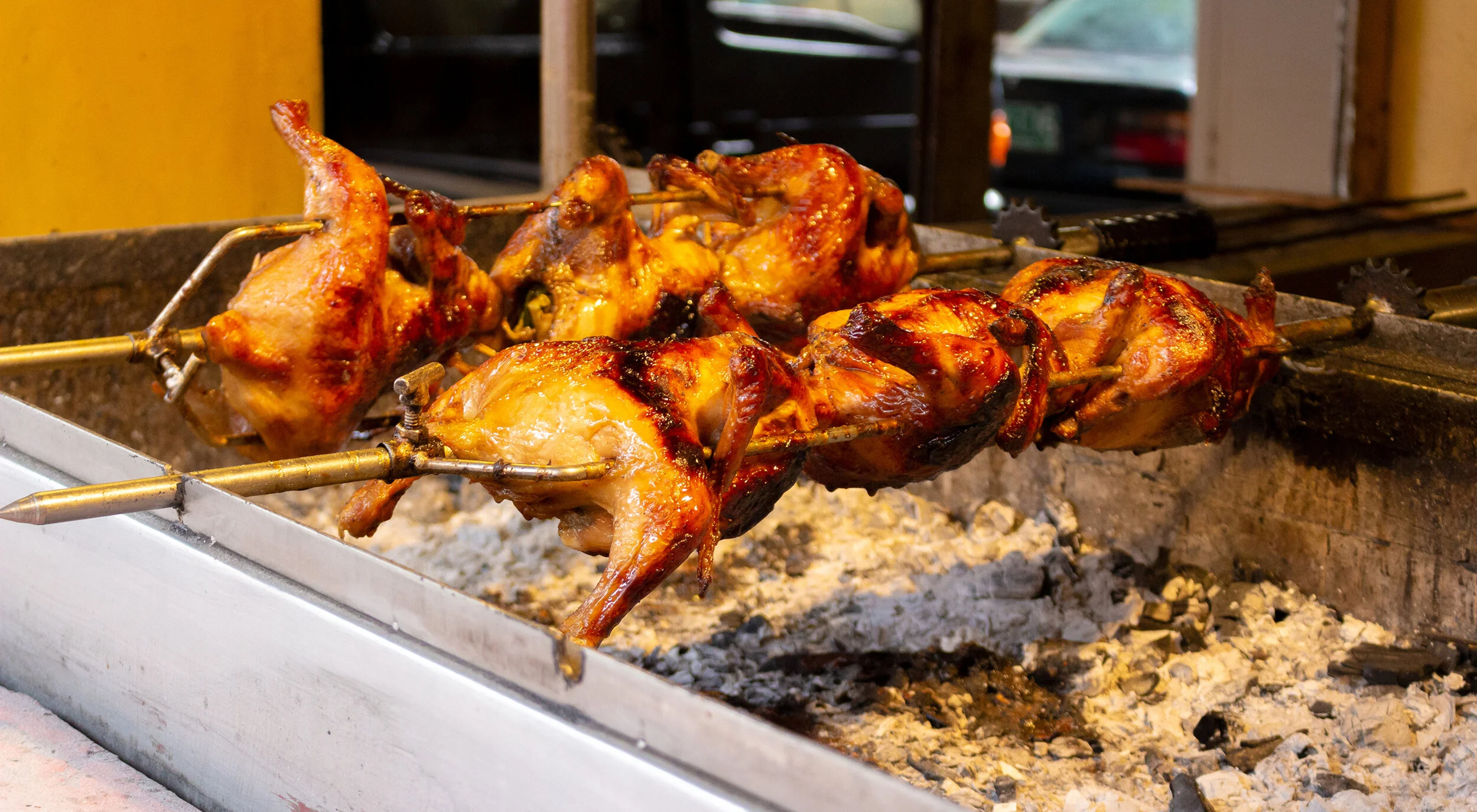 The Filipino street food, lechon manok, roasted chicken.
