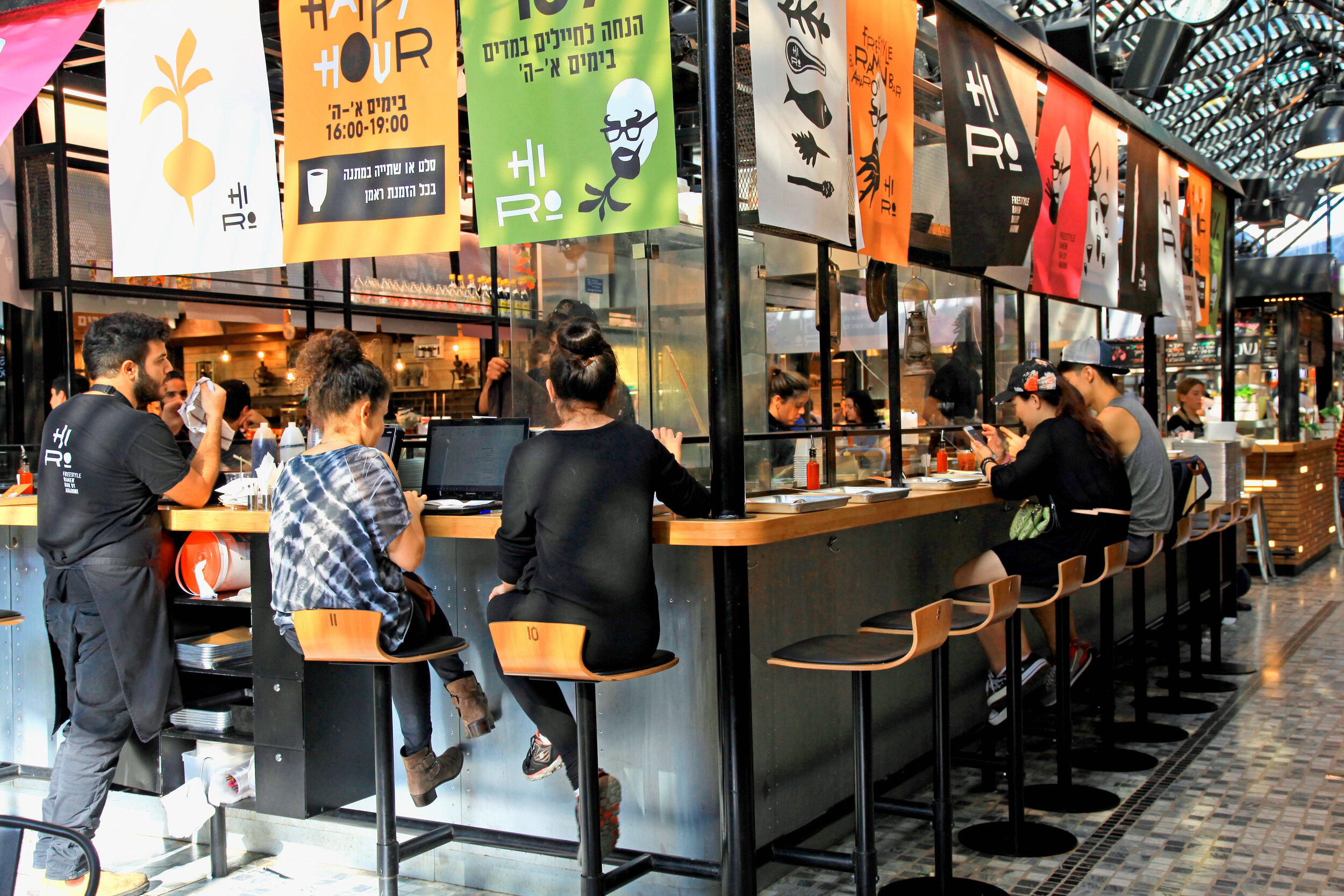 Israeli street food in Tel Aviv outdoor restaurant.